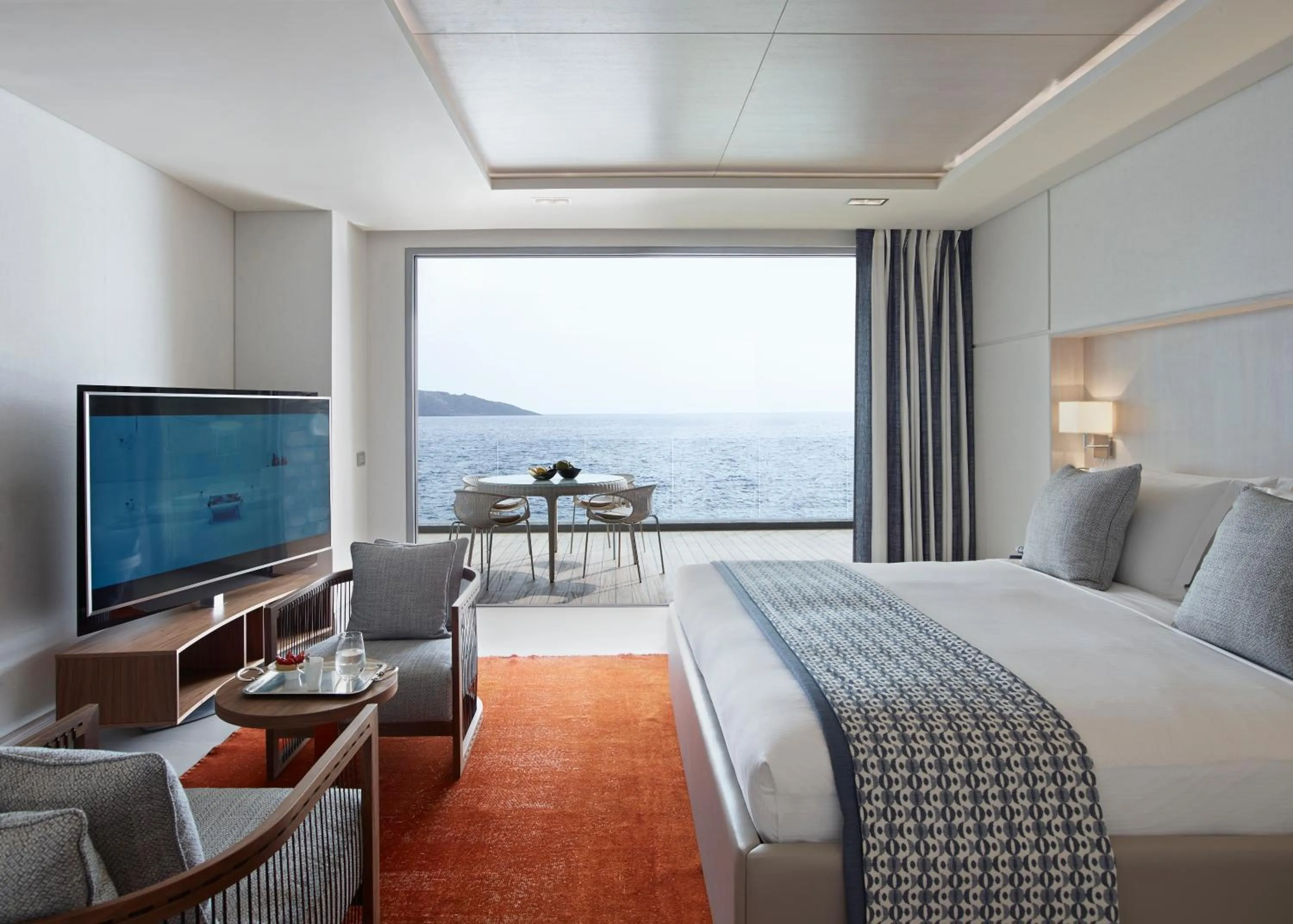 Photo of the whole room, Bed in Elounda Beach Hotel & Villas, a Member of the Leading Hotels of the World