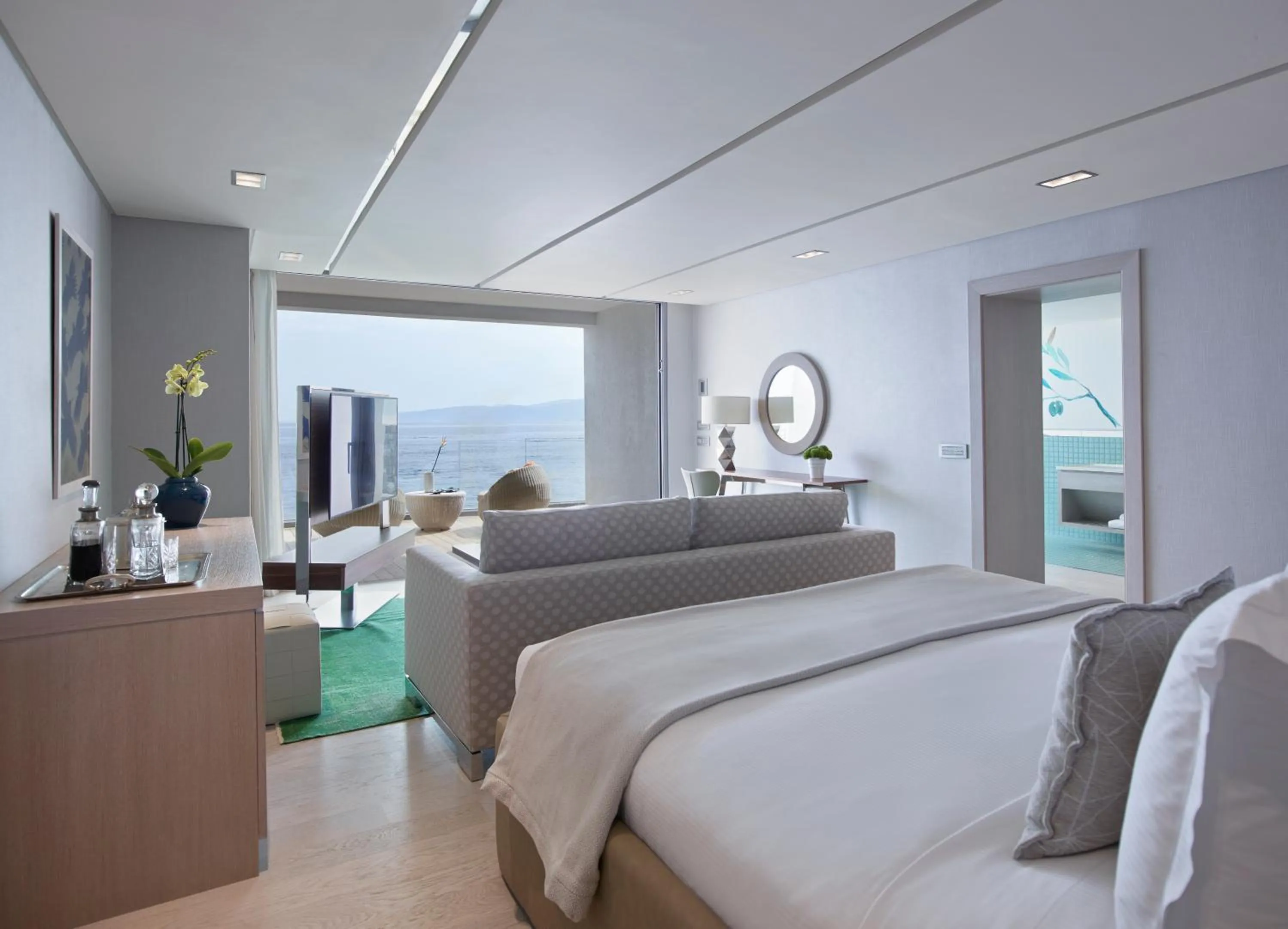 Photo of the whole room, Bed in Elounda Beach Hotel & Villas, a Member of the Leading Hotels of the World
