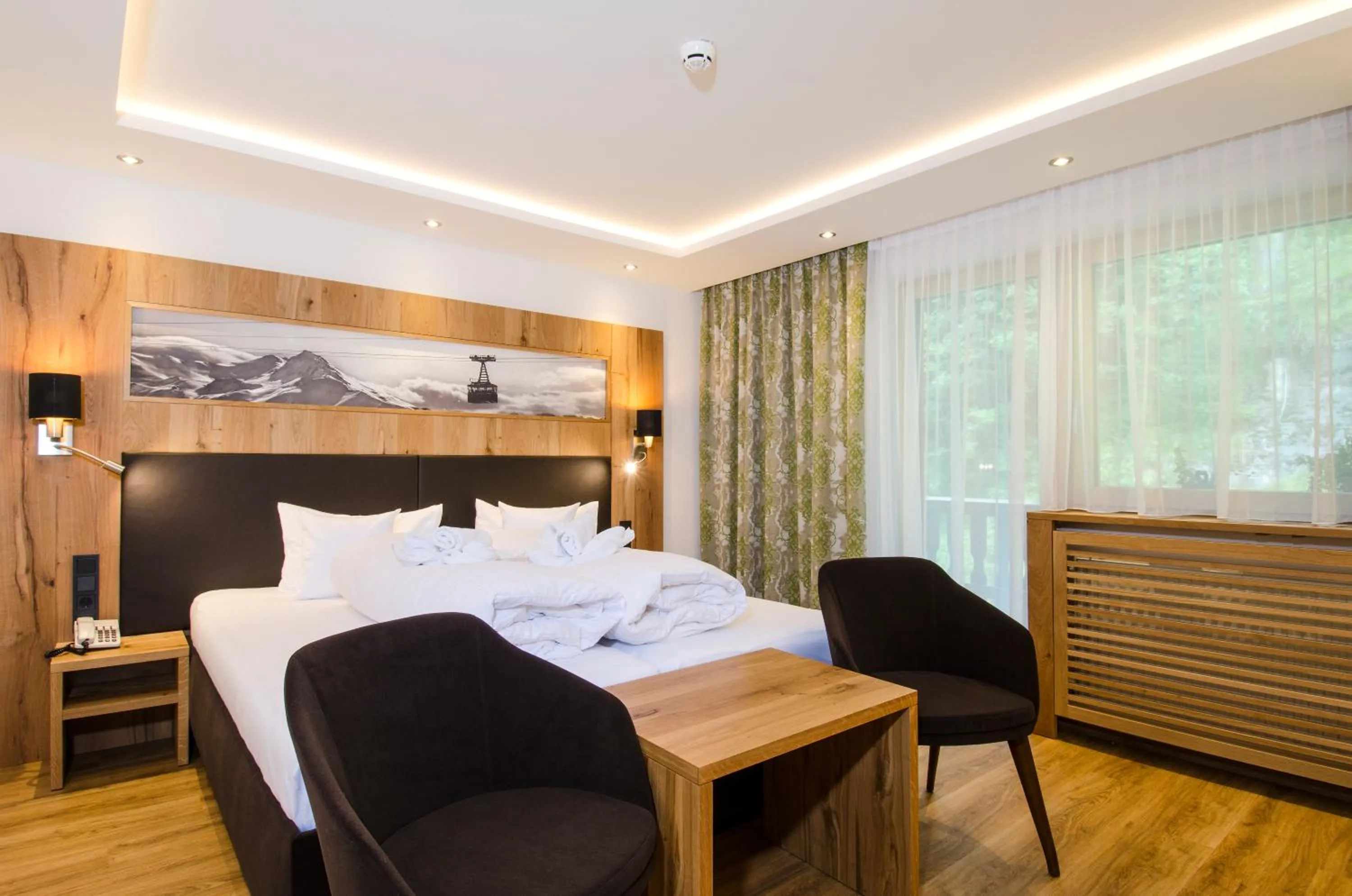 Bed in Hotel Garni Siegele - inklusive Silvretta-Card PREMIUM