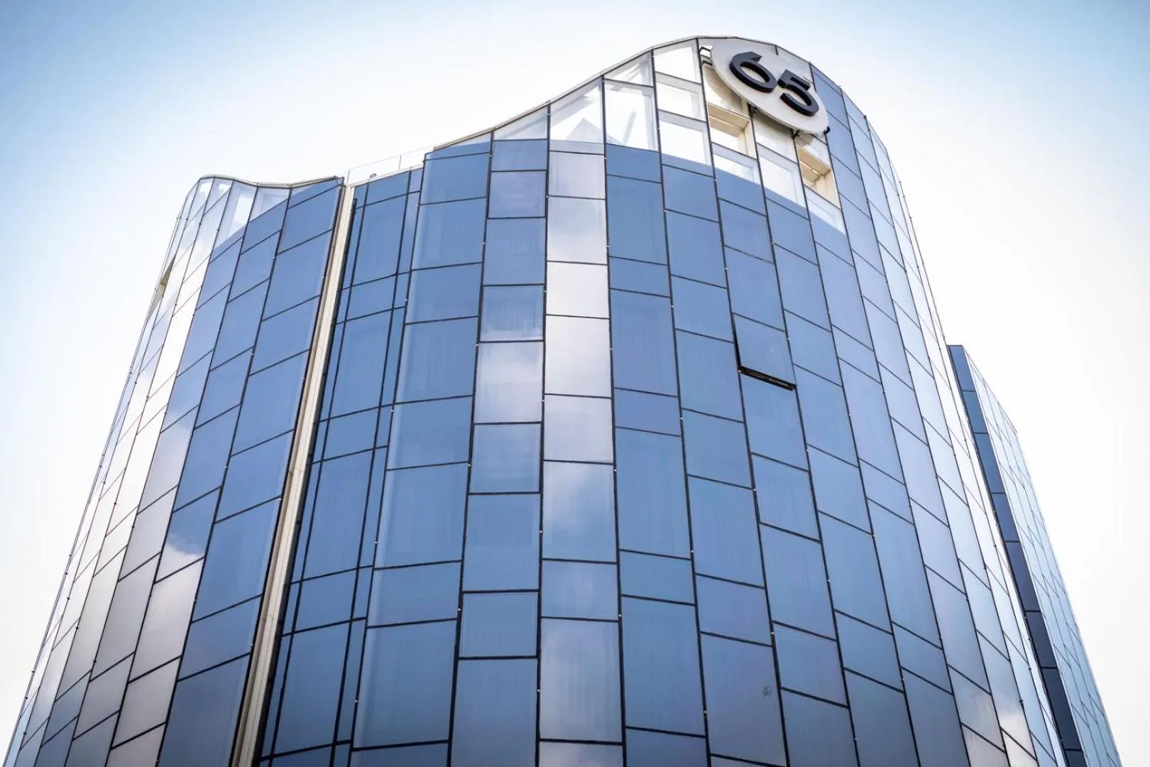 Property logo or sign in 65 Hotel, Rothschild Tel Aviv - an Atlas Boutique Hotel