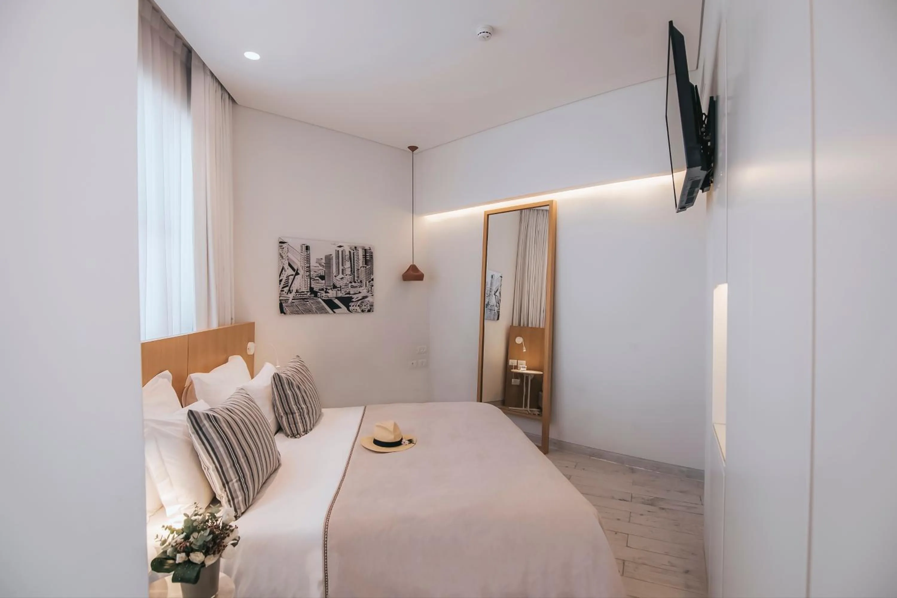 Living room, Bed in 65 Hotel, Rothschild Tel Aviv - an Atlas Boutique Hotel