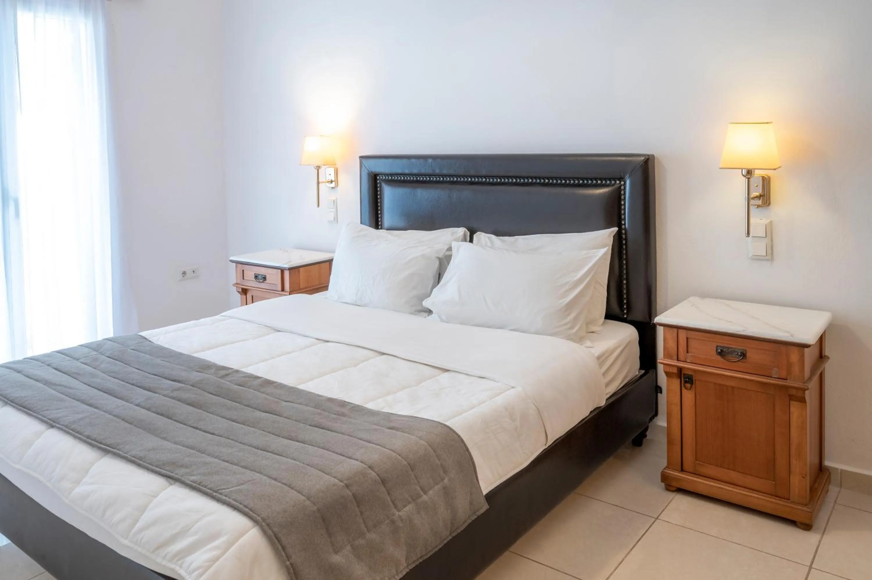 Bed in Smy Mediterranean White Santorini