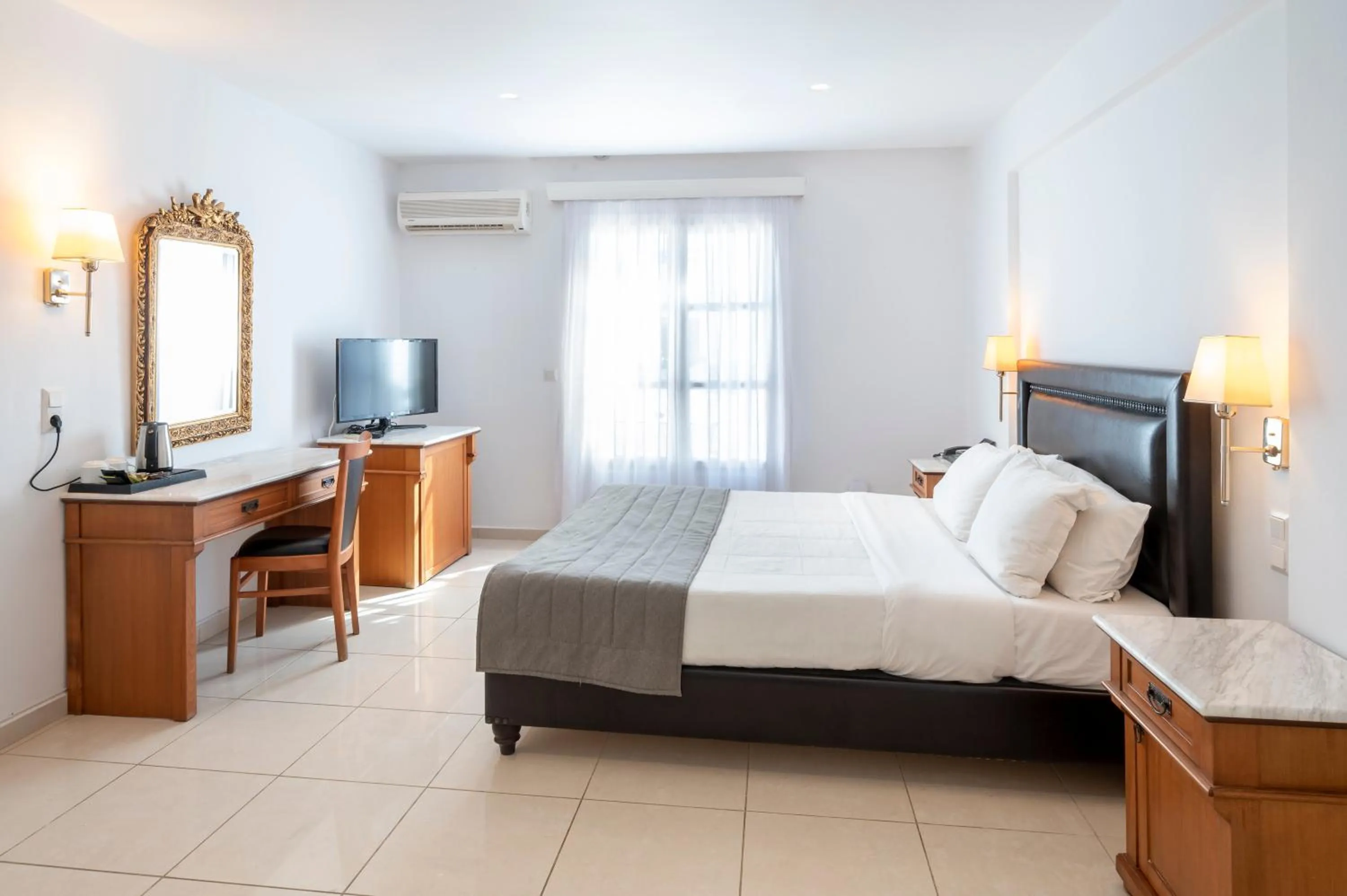 Bed in Smy Mediterranean White Santorini