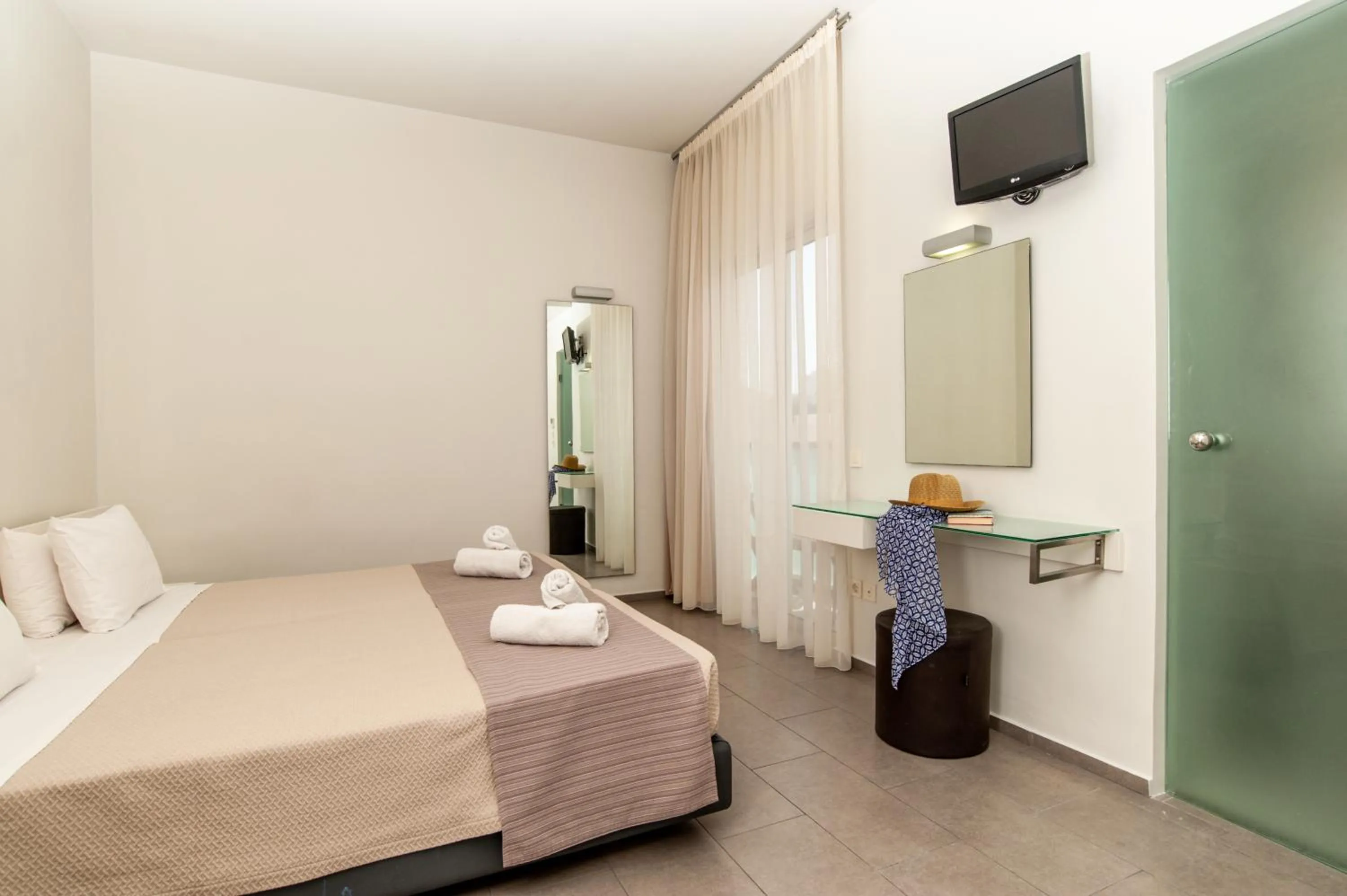 Bedroom in Atlantis Boutique City Hotel