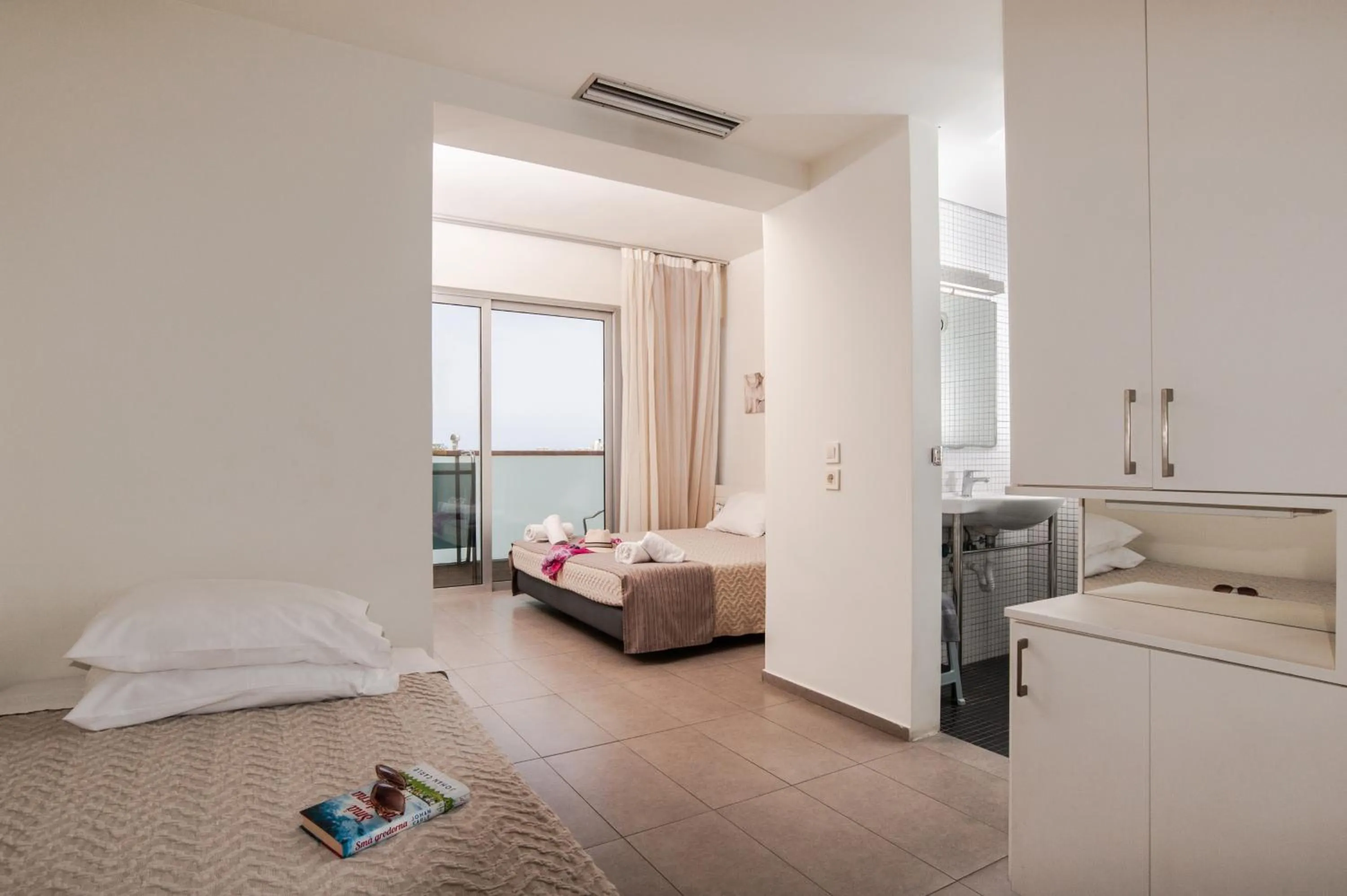 Bedroom in Atlantis Boutique City Hotel