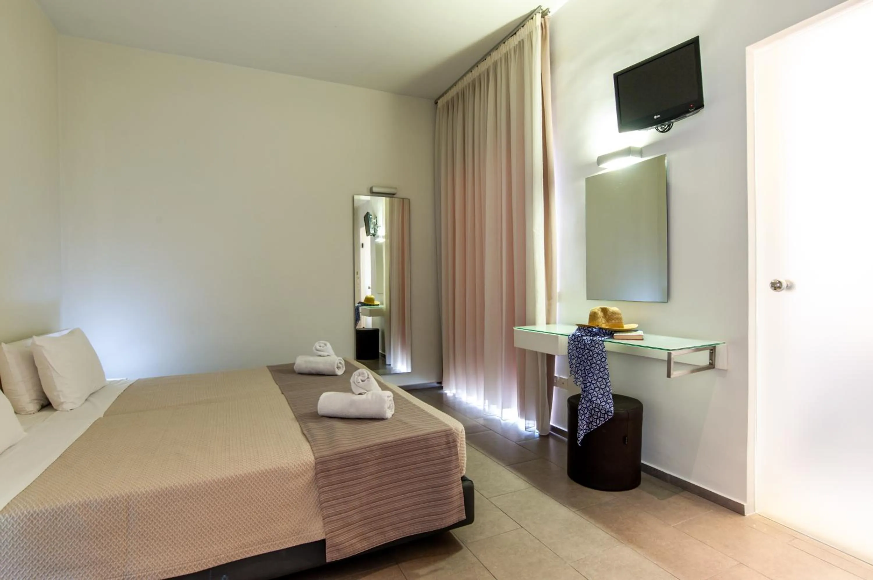 Bed in Atlantis Boutique City Hotel