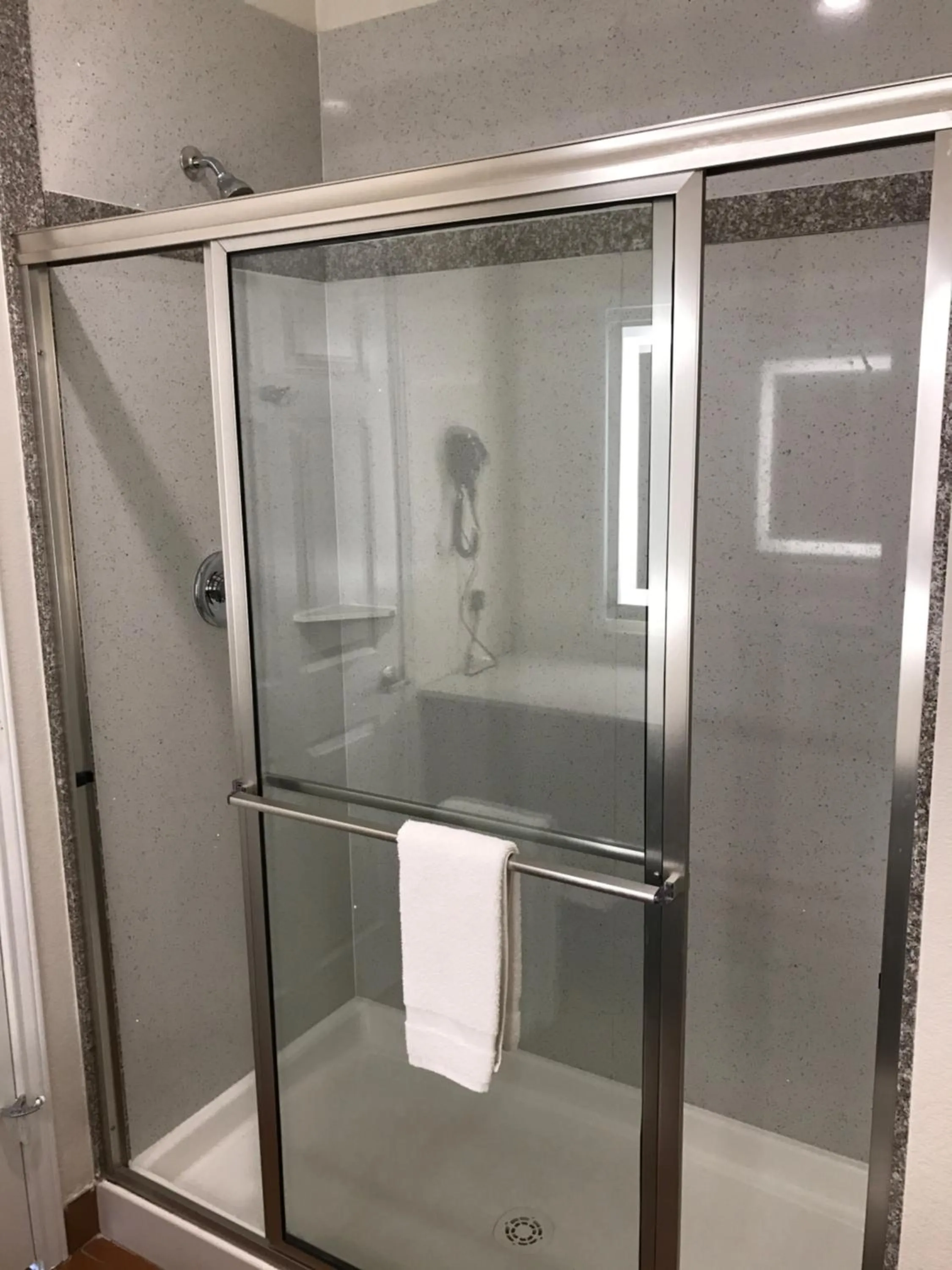 Shower in Regency Inn & Suites- NW Houston