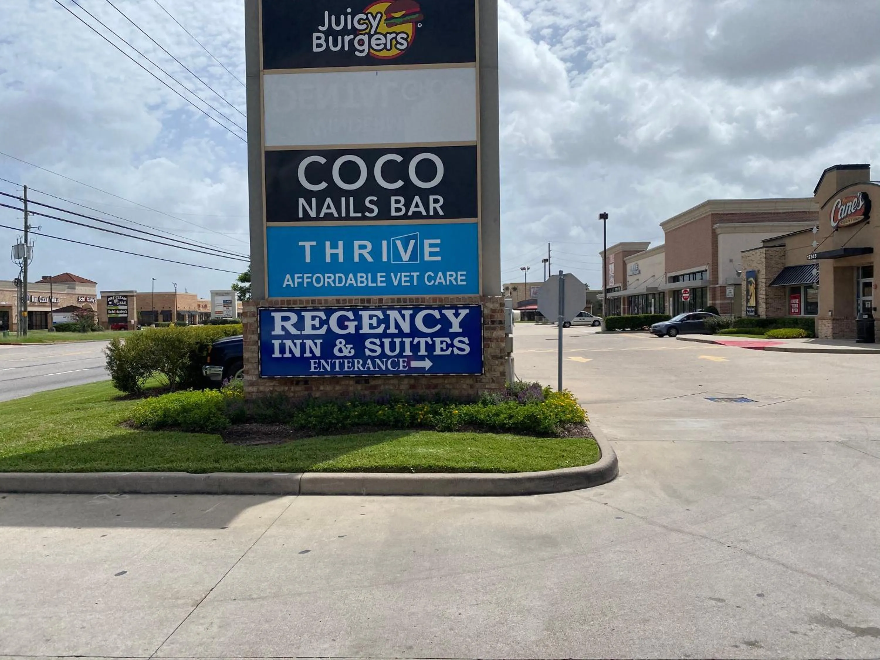 Property logo or sign in Regency Inn & Suites- NW Houston