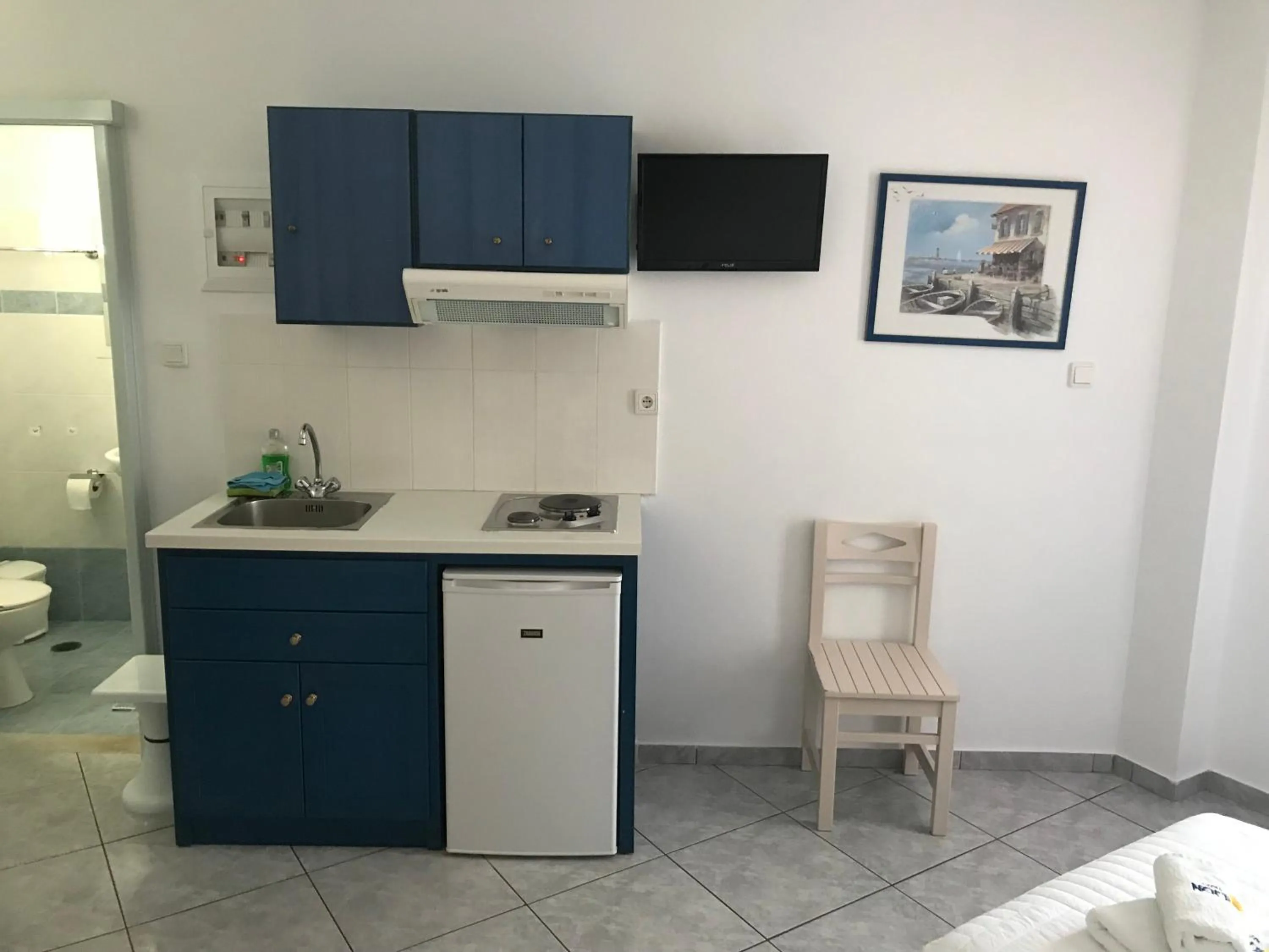 Kitchen or kitchenette in Ilion Hotel