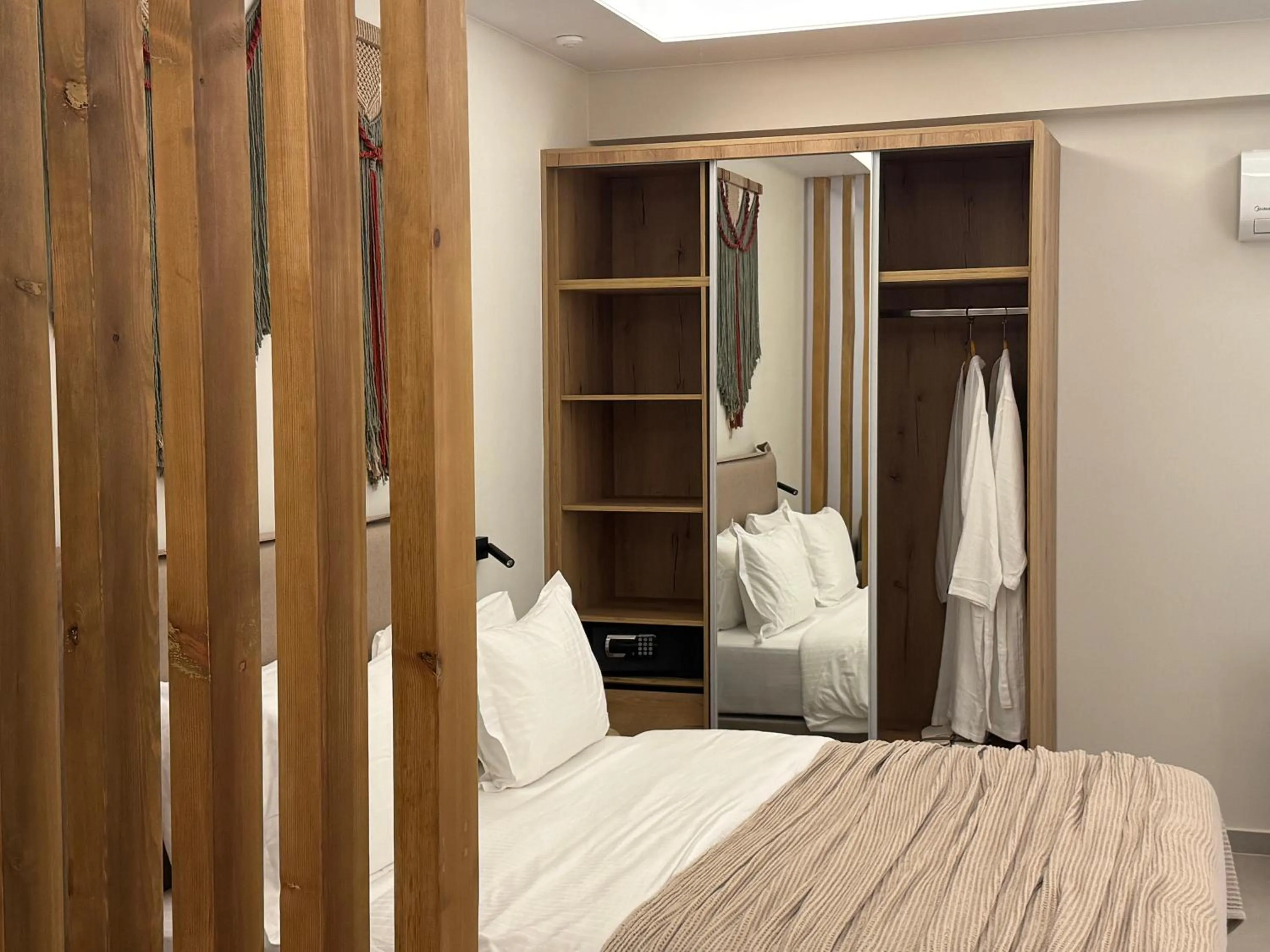 Bedroom, Bed in Τhe Noverian Antama Organic Beach Resort Chania