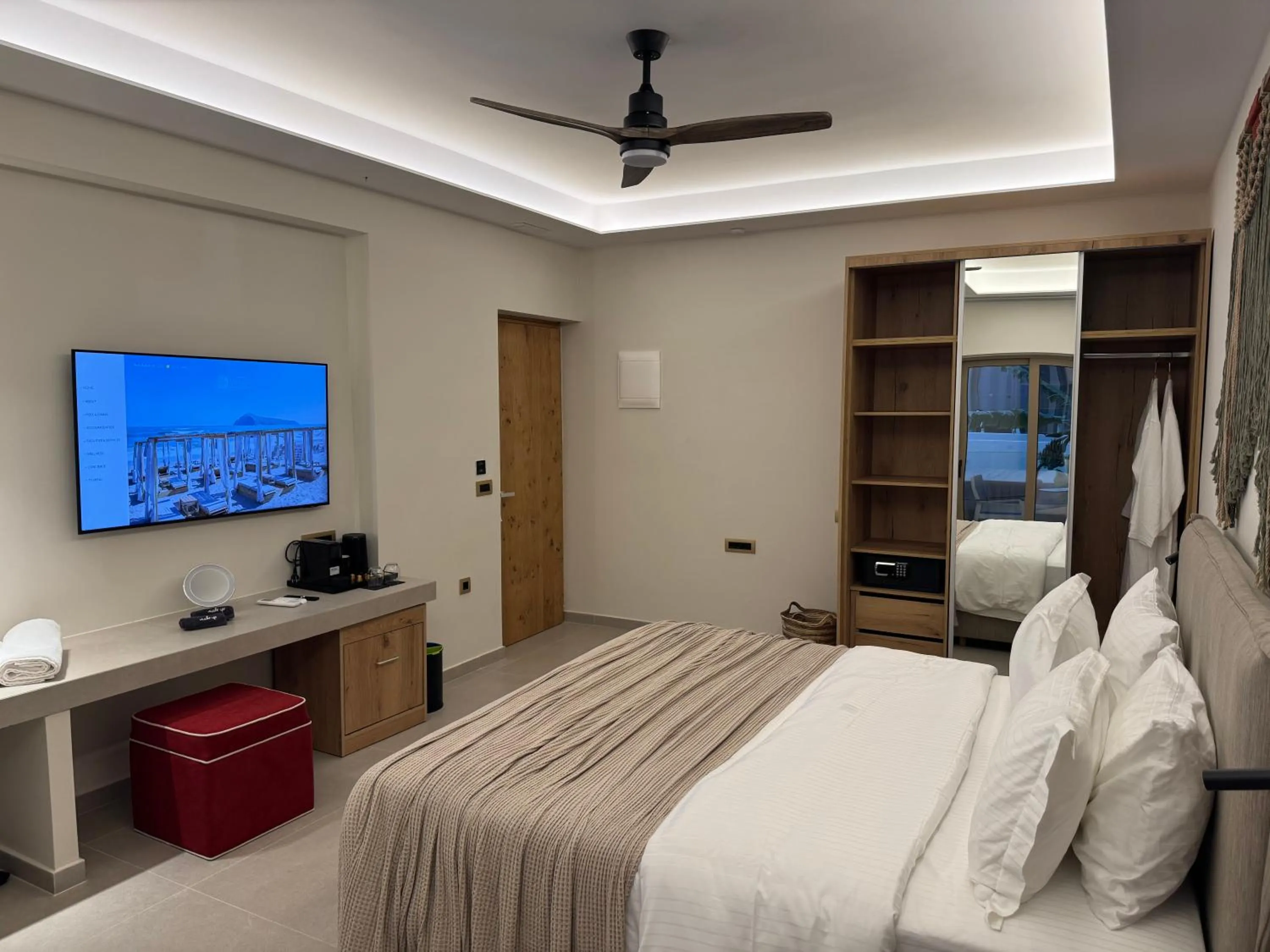 TV and multimedia, Bed in Τhe Noverian Antama Organic Beach Resort Chania