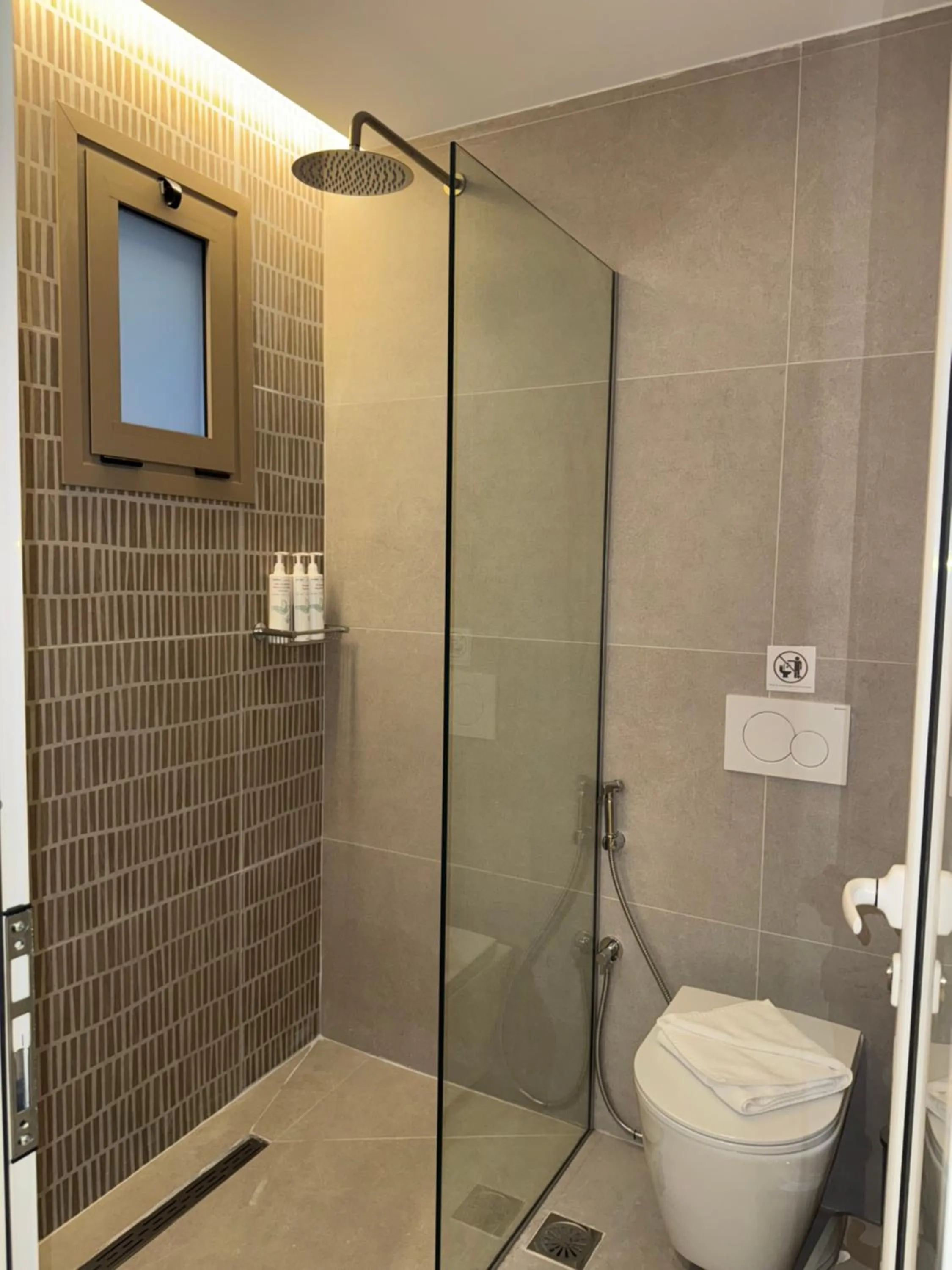 Shower in Τhe Noverian Antama Organic Beach Resort Chania