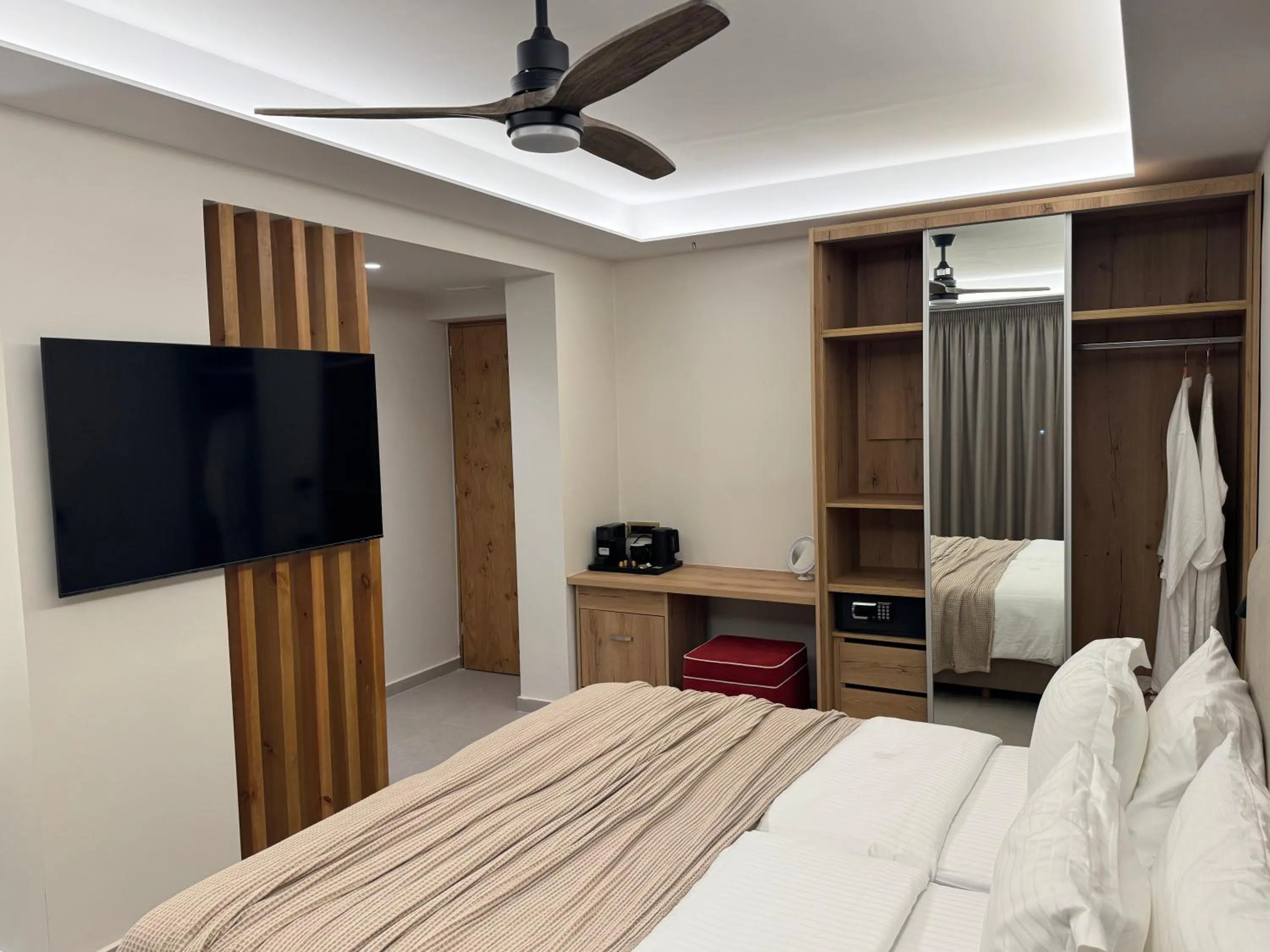 TV and multimedia, Bed in Τhe Noverian Antama Organic Beach Resort Chania