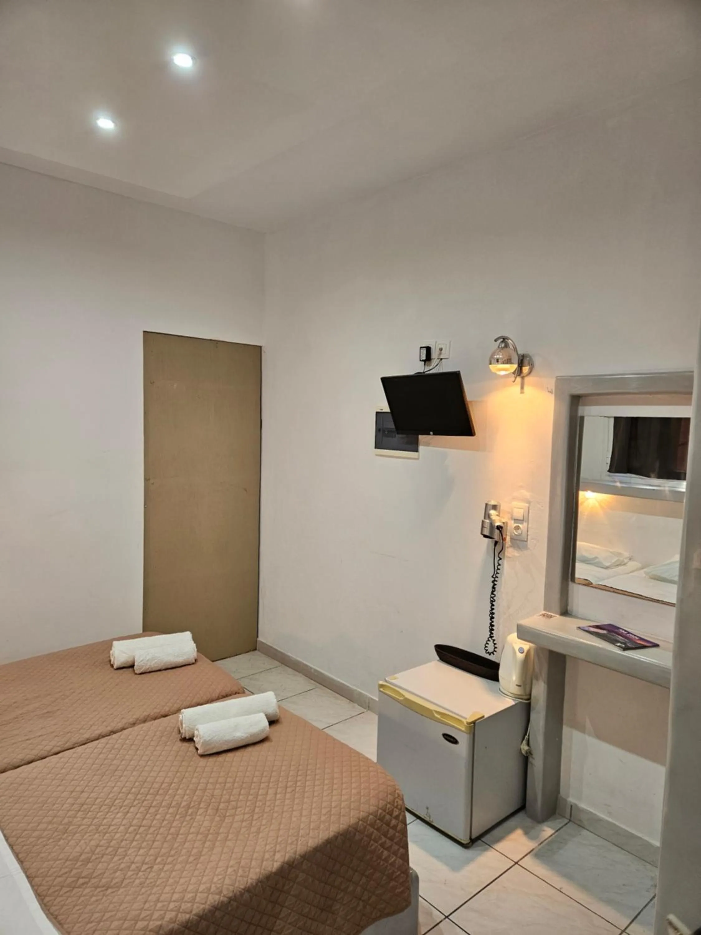 Bed in Skala Sunset Hotel and spa