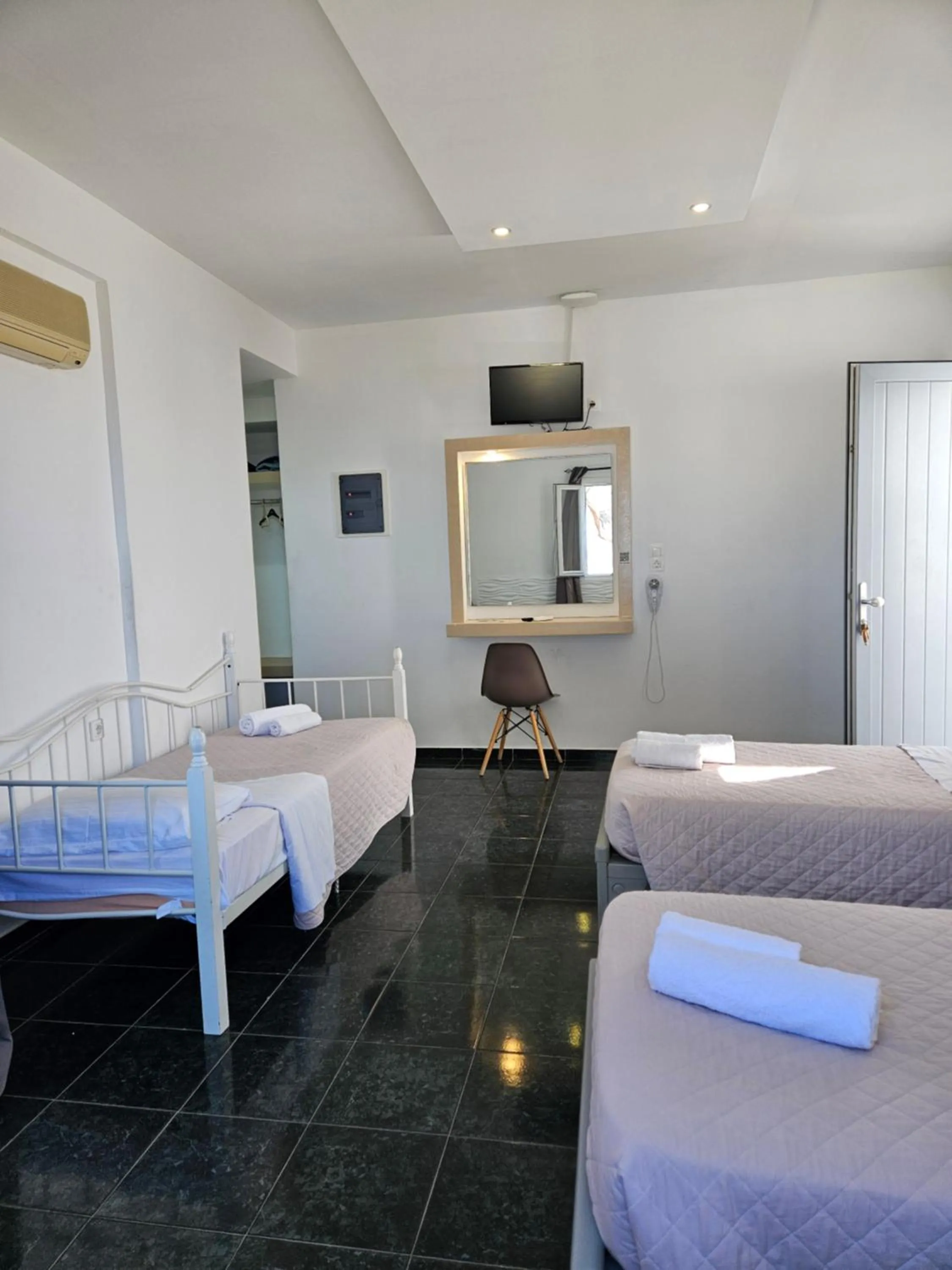 Bed in Skala Sunset Hotel and spa