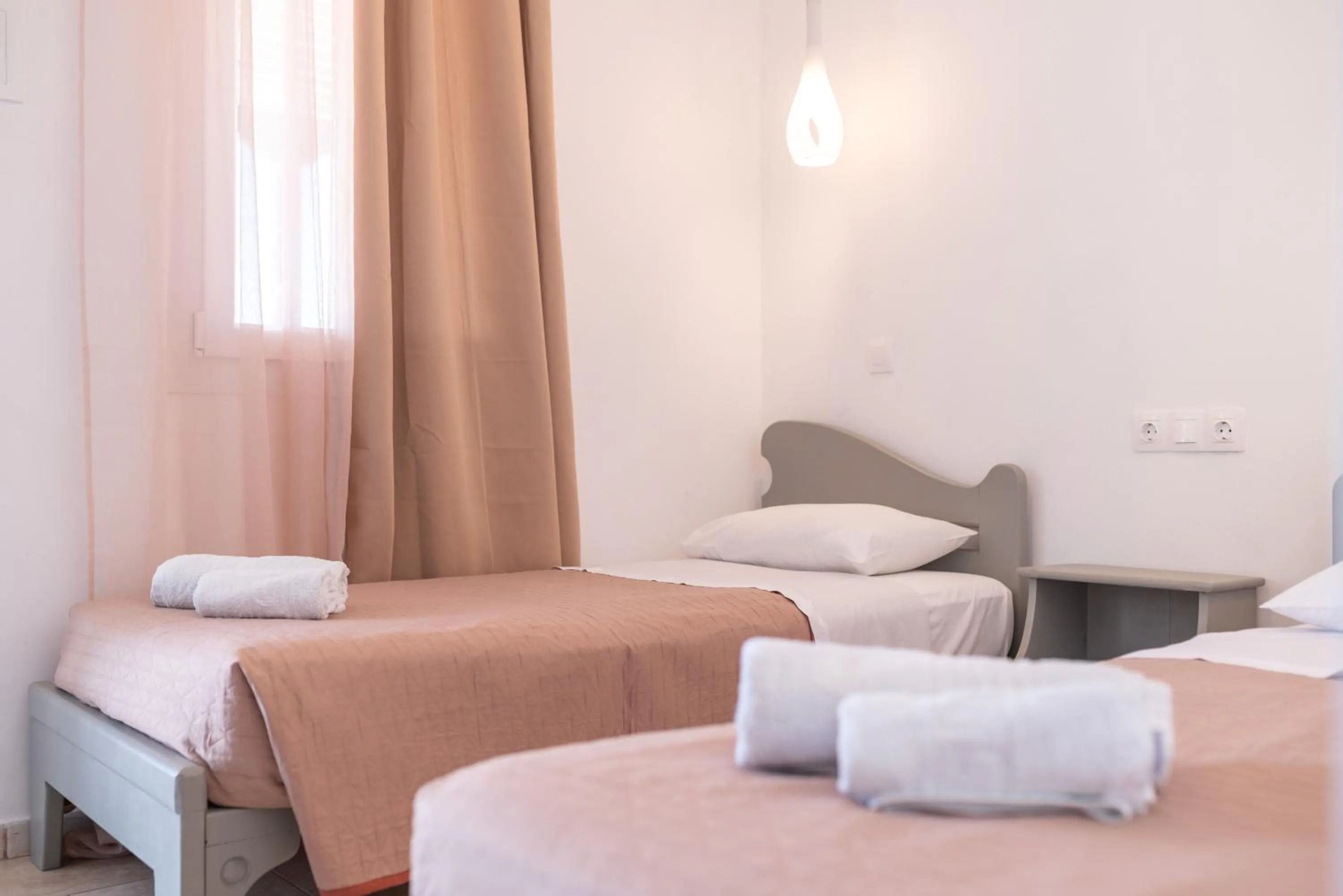 Bed in Skala Sunset Hotel and spa