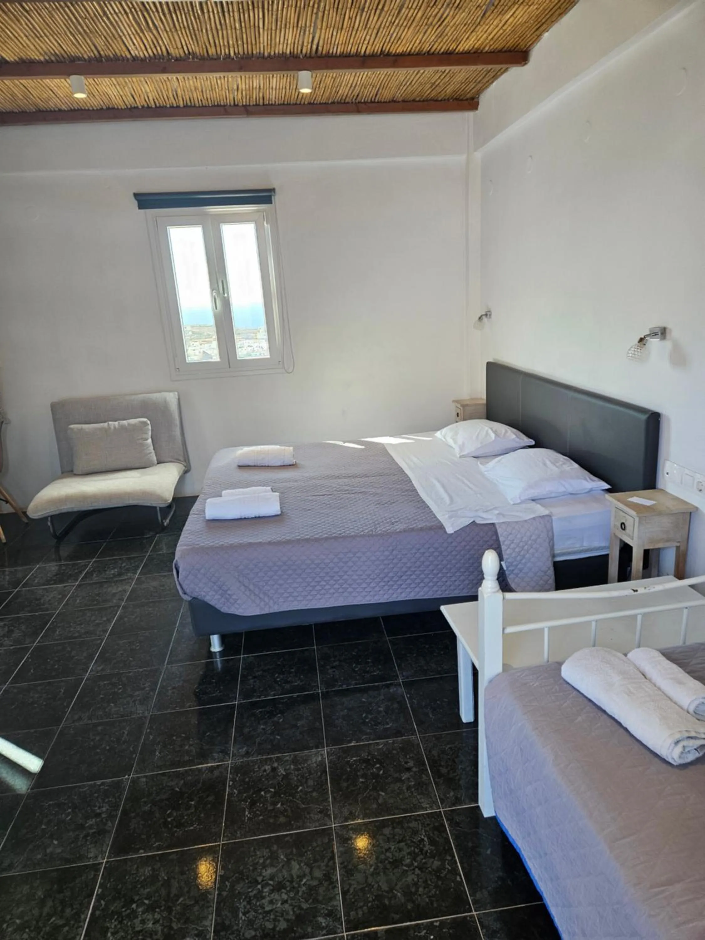 Bed in Skala Sunset Hotel and spa