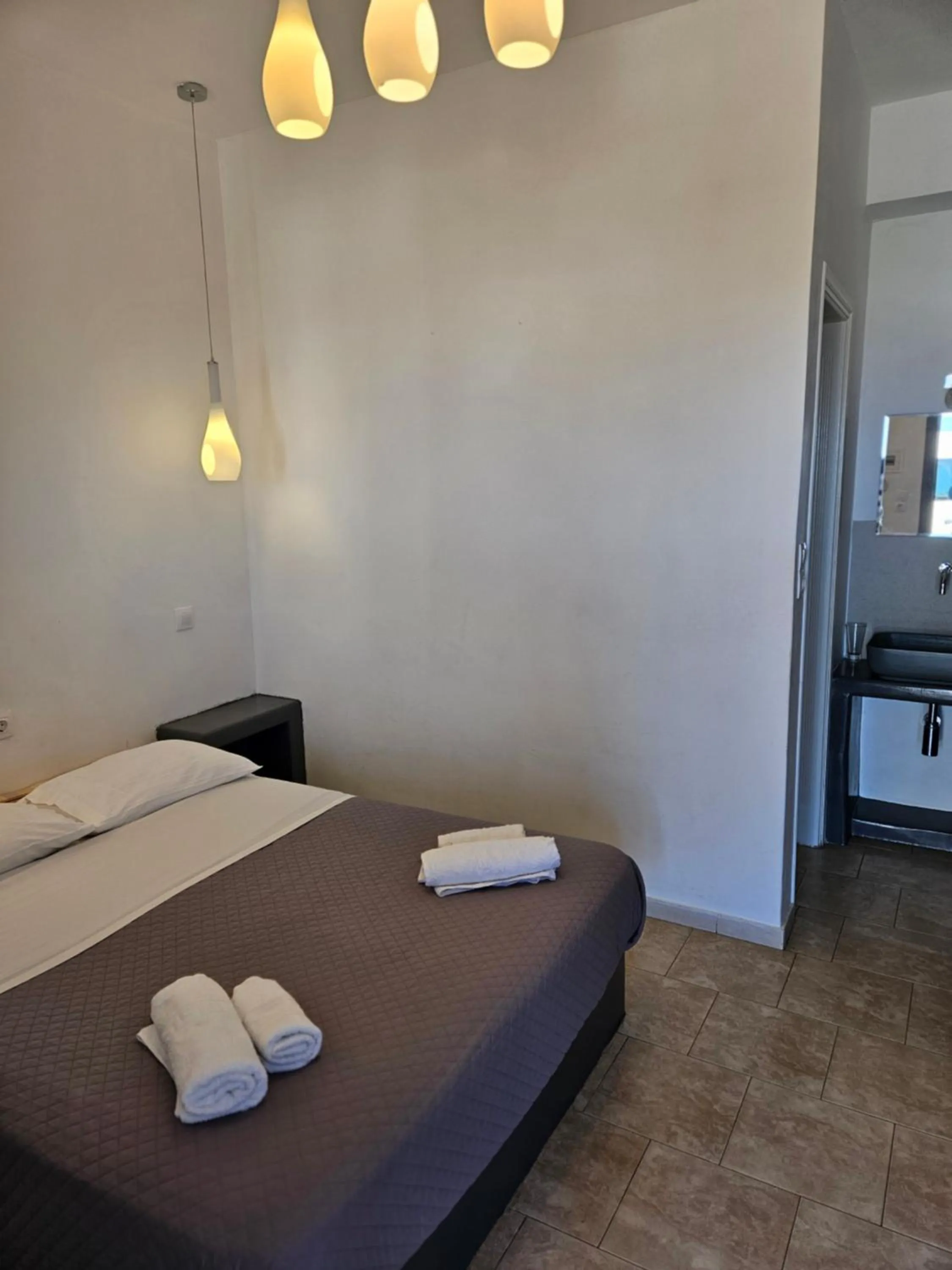 Bed in Skala Sunset Hotel and spa