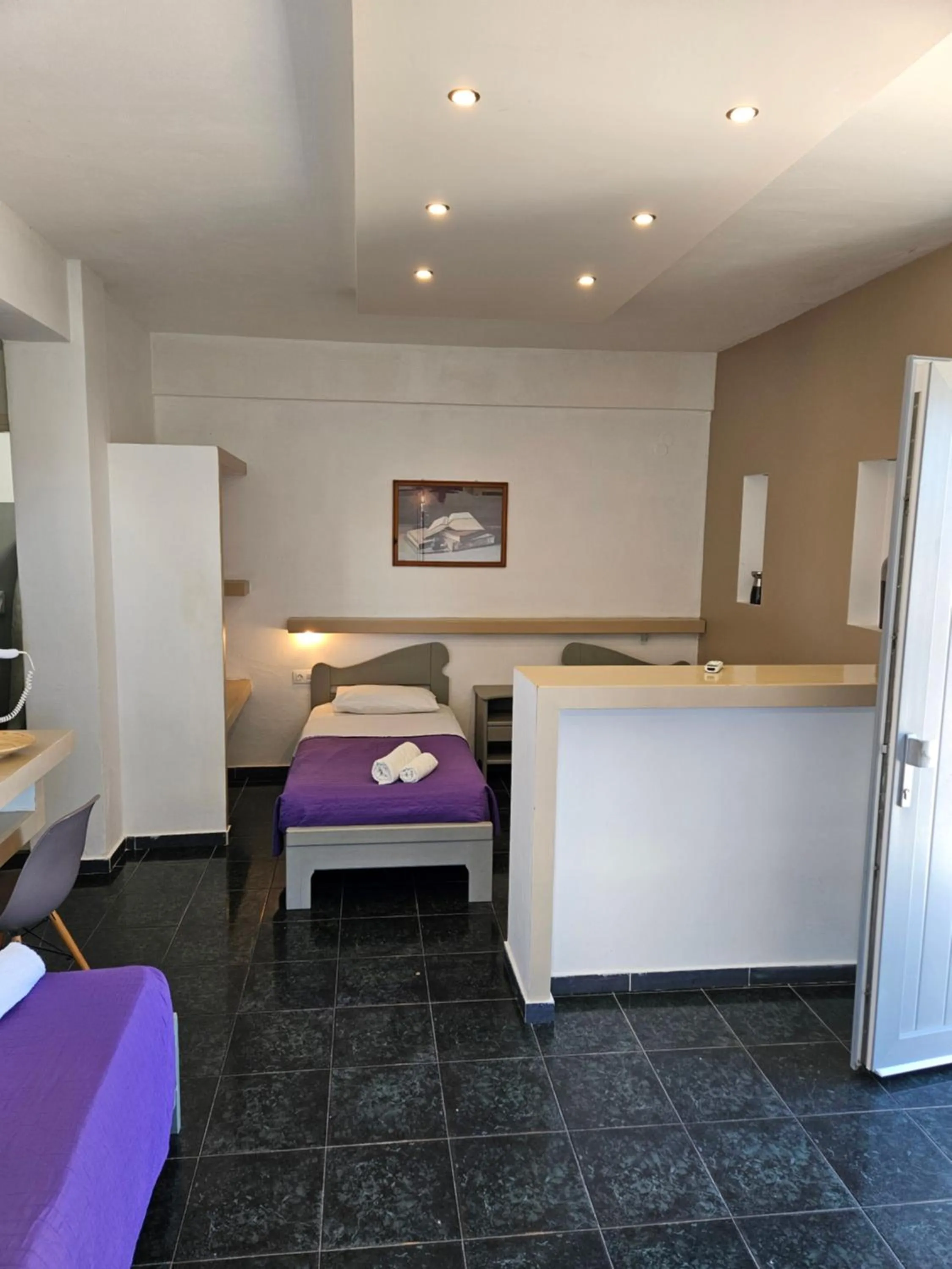 Bed in Skala Sunset Hotel and spa