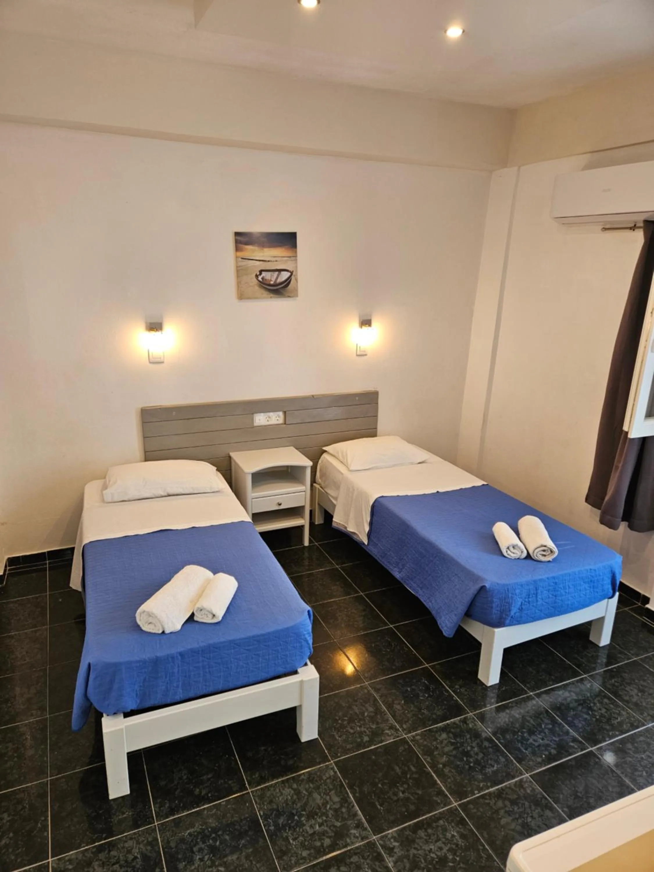 Bed in Skala Sunset Hotel and spa