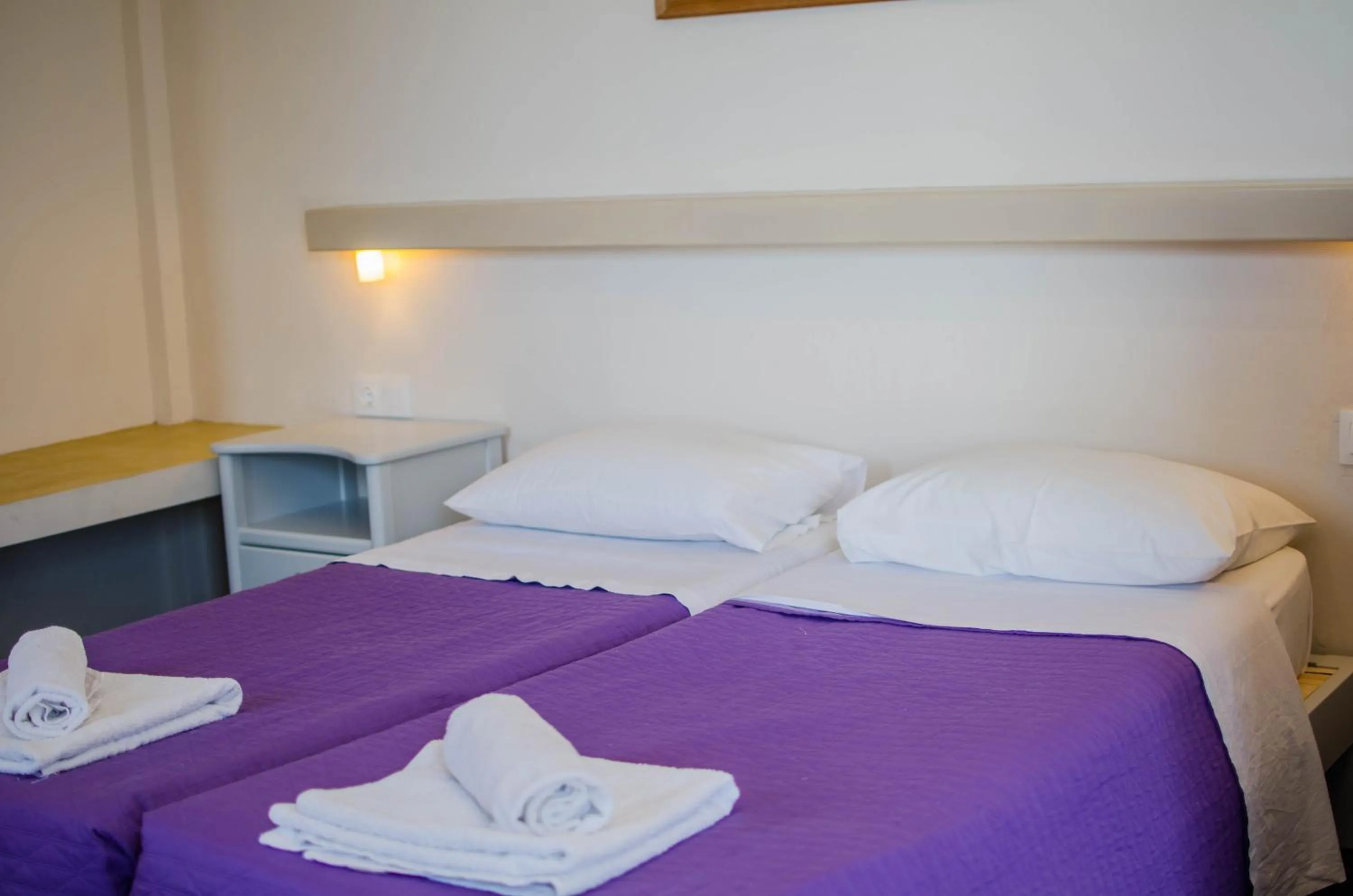 Bed in Skala Sunset Hotel and spa