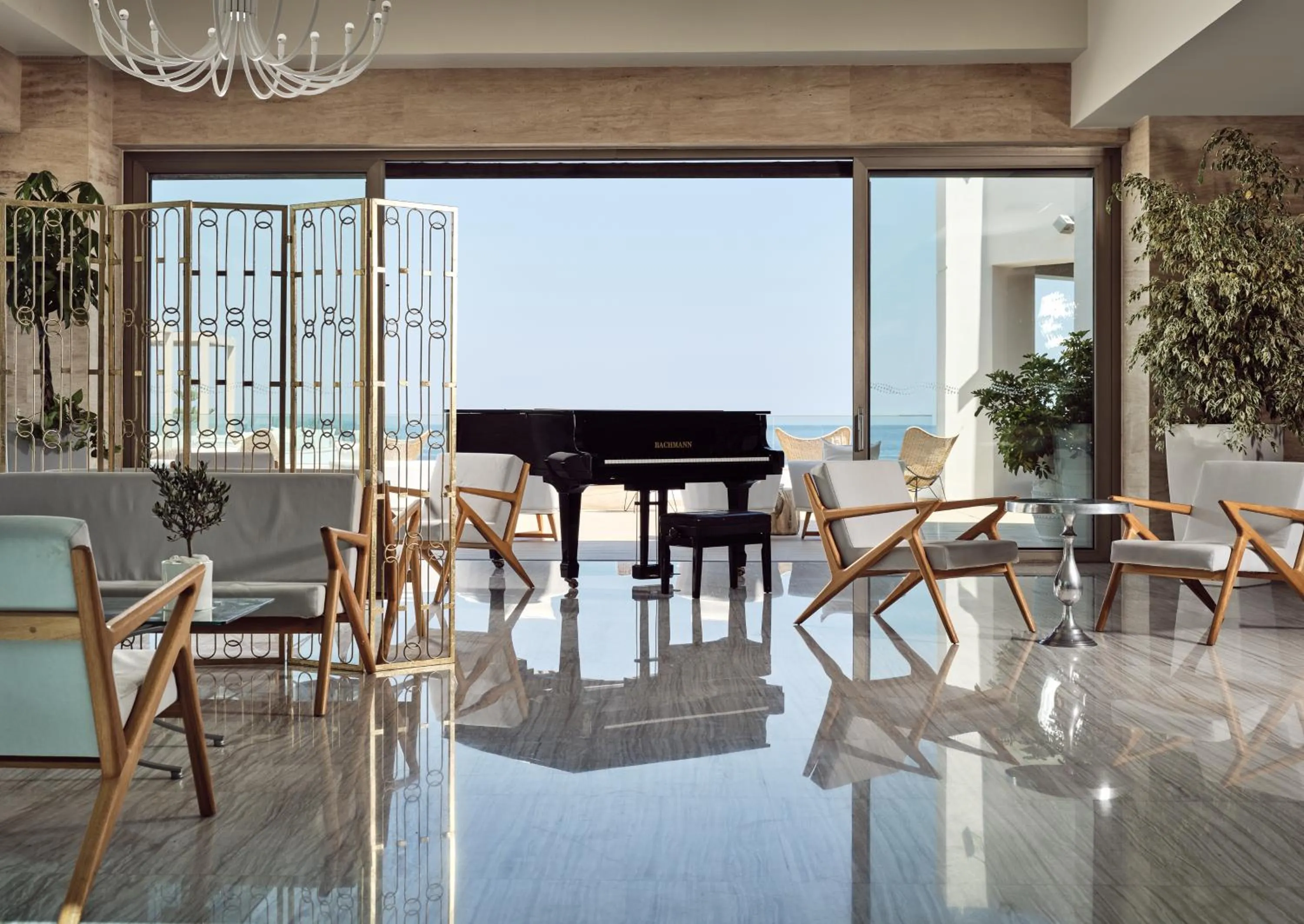 Lobby or reception in The Royal Blue a Luxury Beach Resort