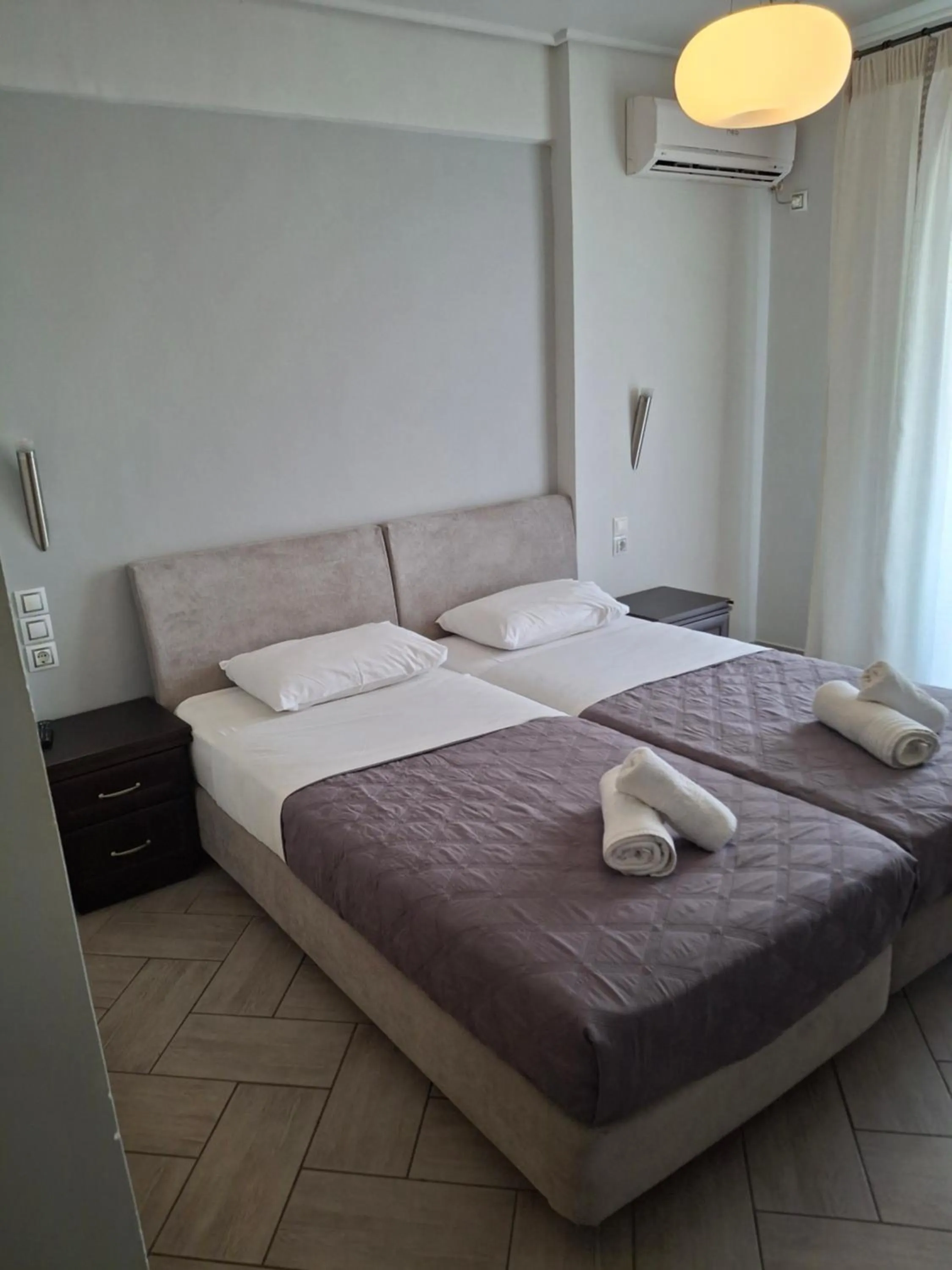 Bed in Palmyra Hotel