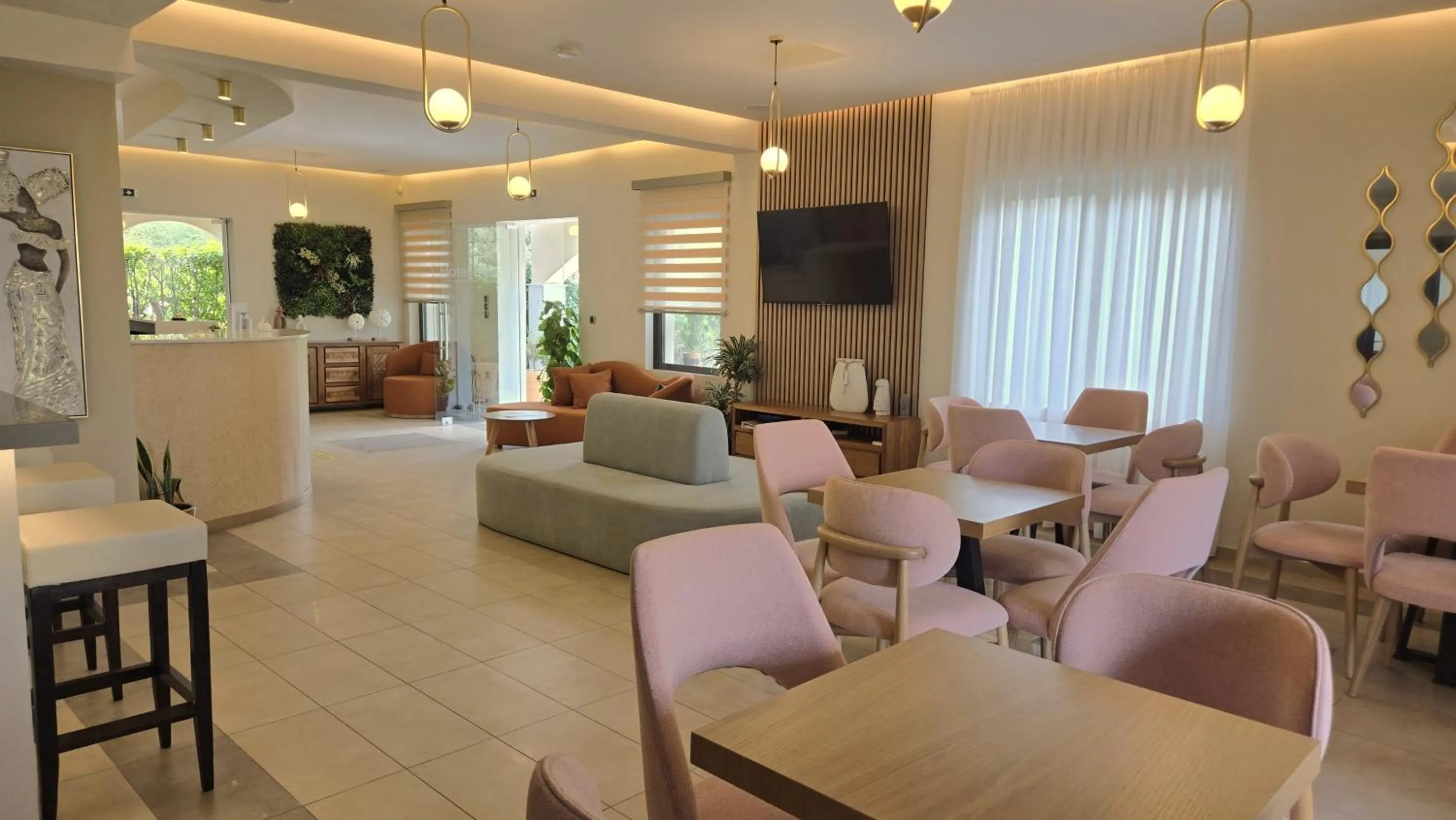 Communal lounge/ TV room in Eleana Boutique Hotel & Blue Infinity