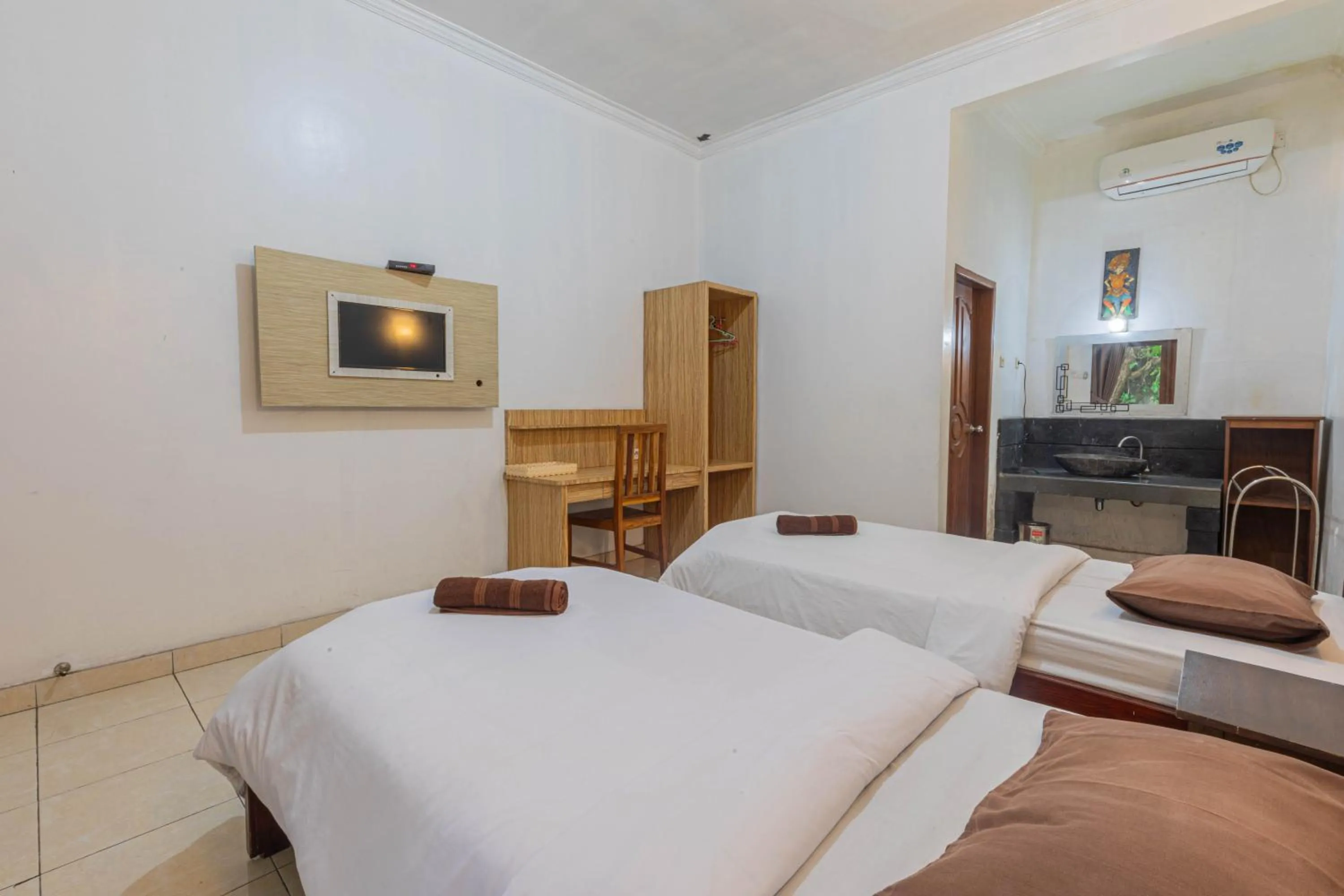 Photo of the whole room, Bed in Transit Inn Senggigi