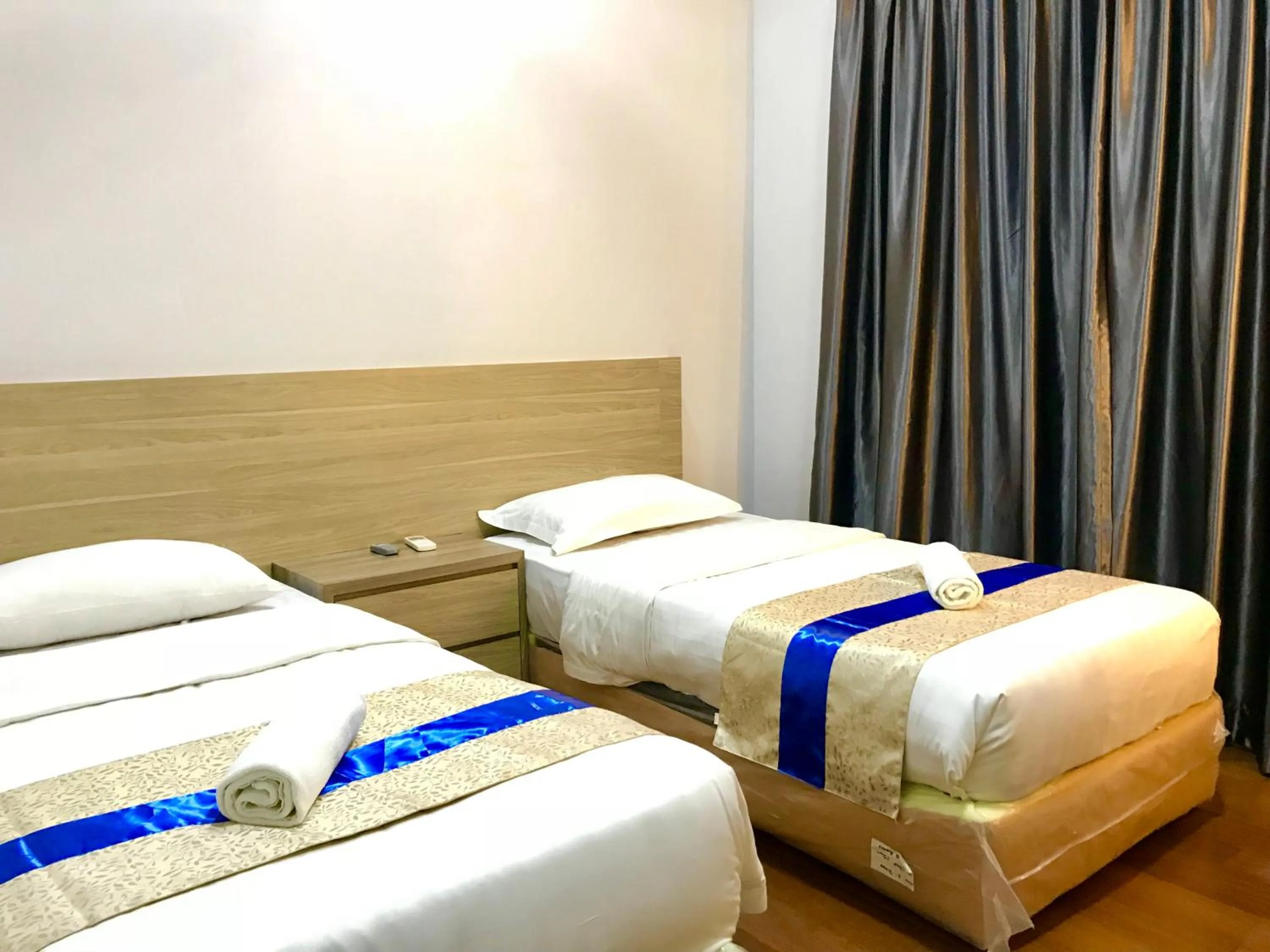 Bedroom, Bed in Sunset Seaview Vacation Condos @ IMAGO Shopping Mall