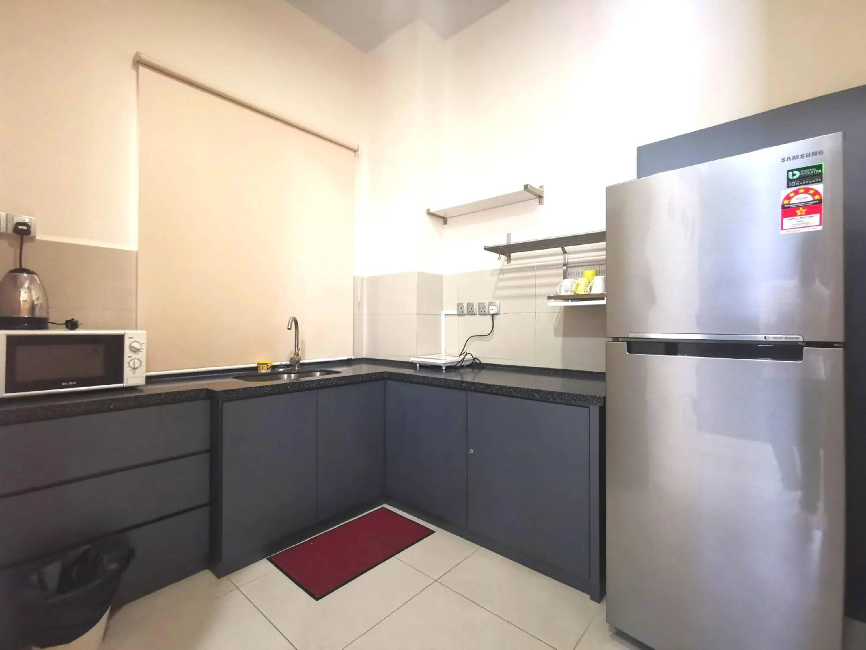 Kitchen or kitchenette in Sunset Seaview Vacation Condos @ IMAGO Shopping Mall