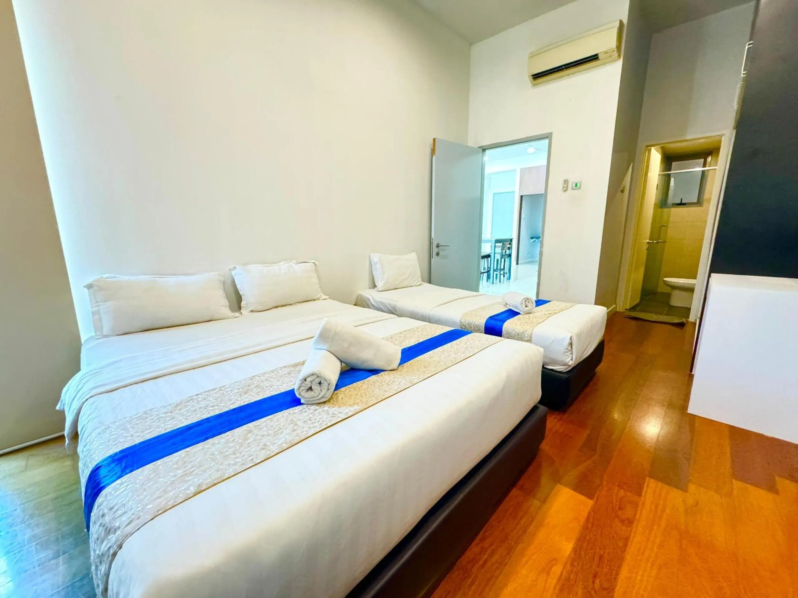 Bedroom, Bed in Sunset Seaview Vacation Condos @ IMAGO Shopping Mall