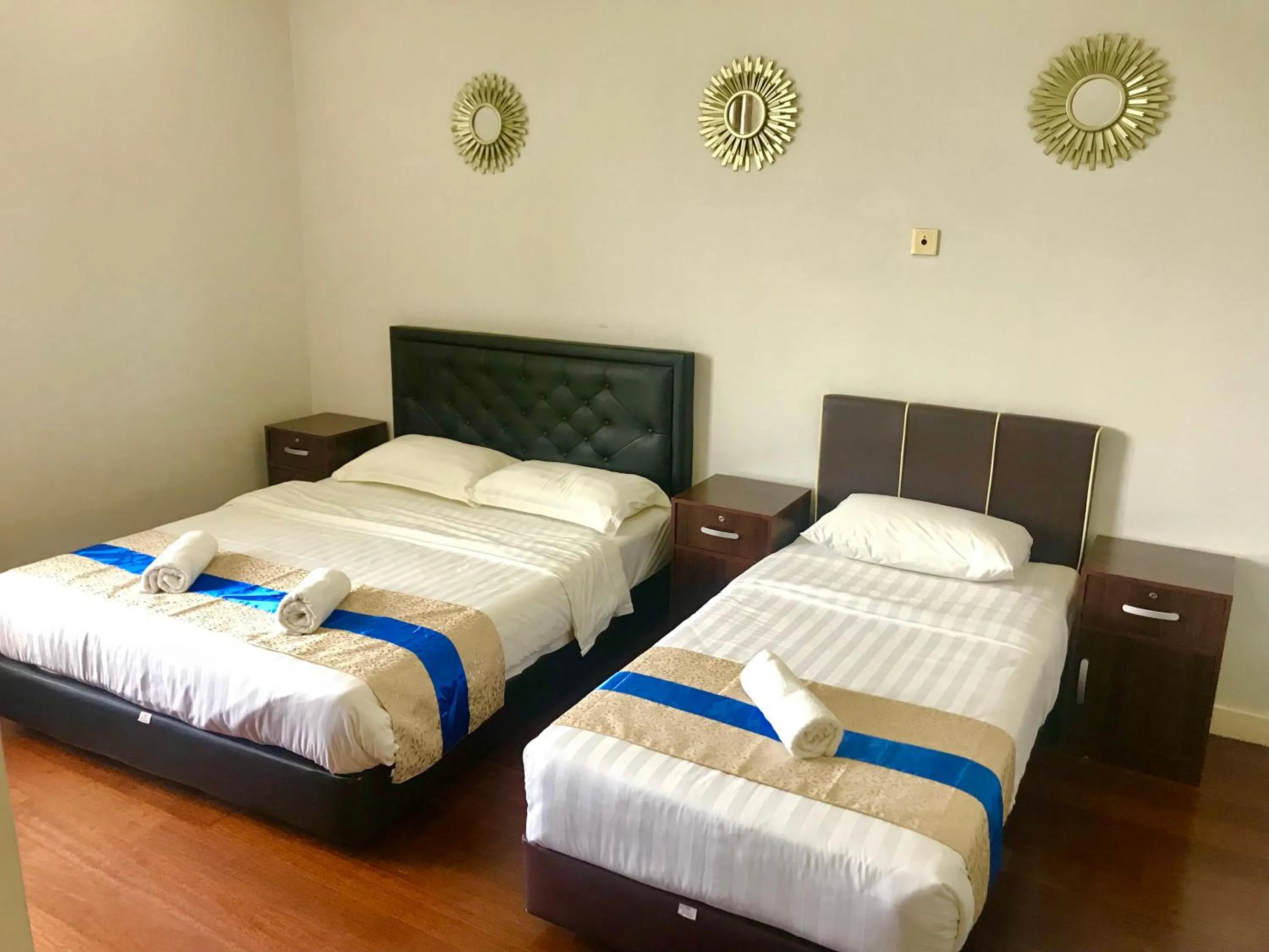 Bed in Sunset Seaview Vacation Condos @ IMAGO Shopping Mall