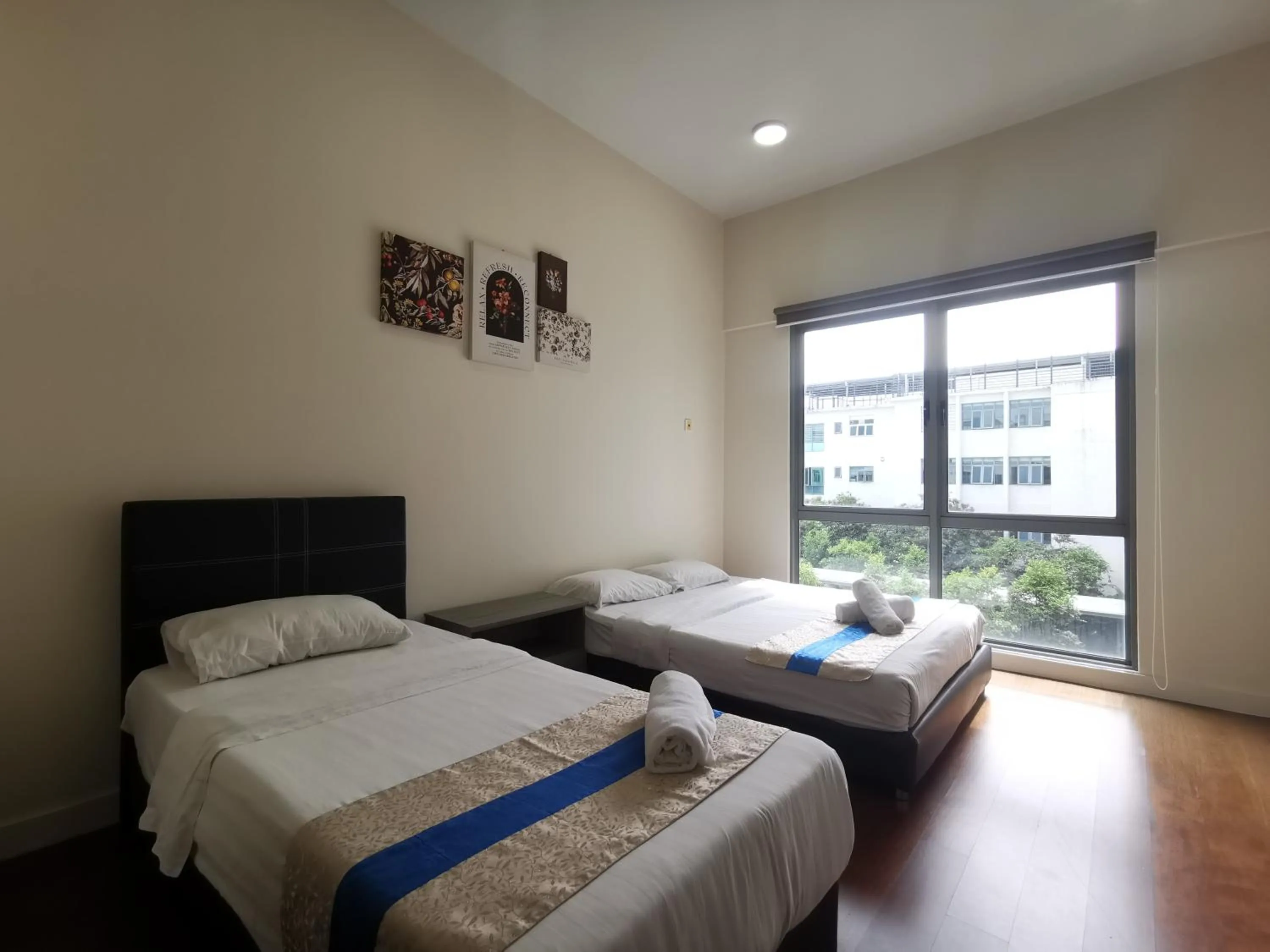 Bed in Sunset Seaview Vacation Condos @ IMAGO Shopping Mall