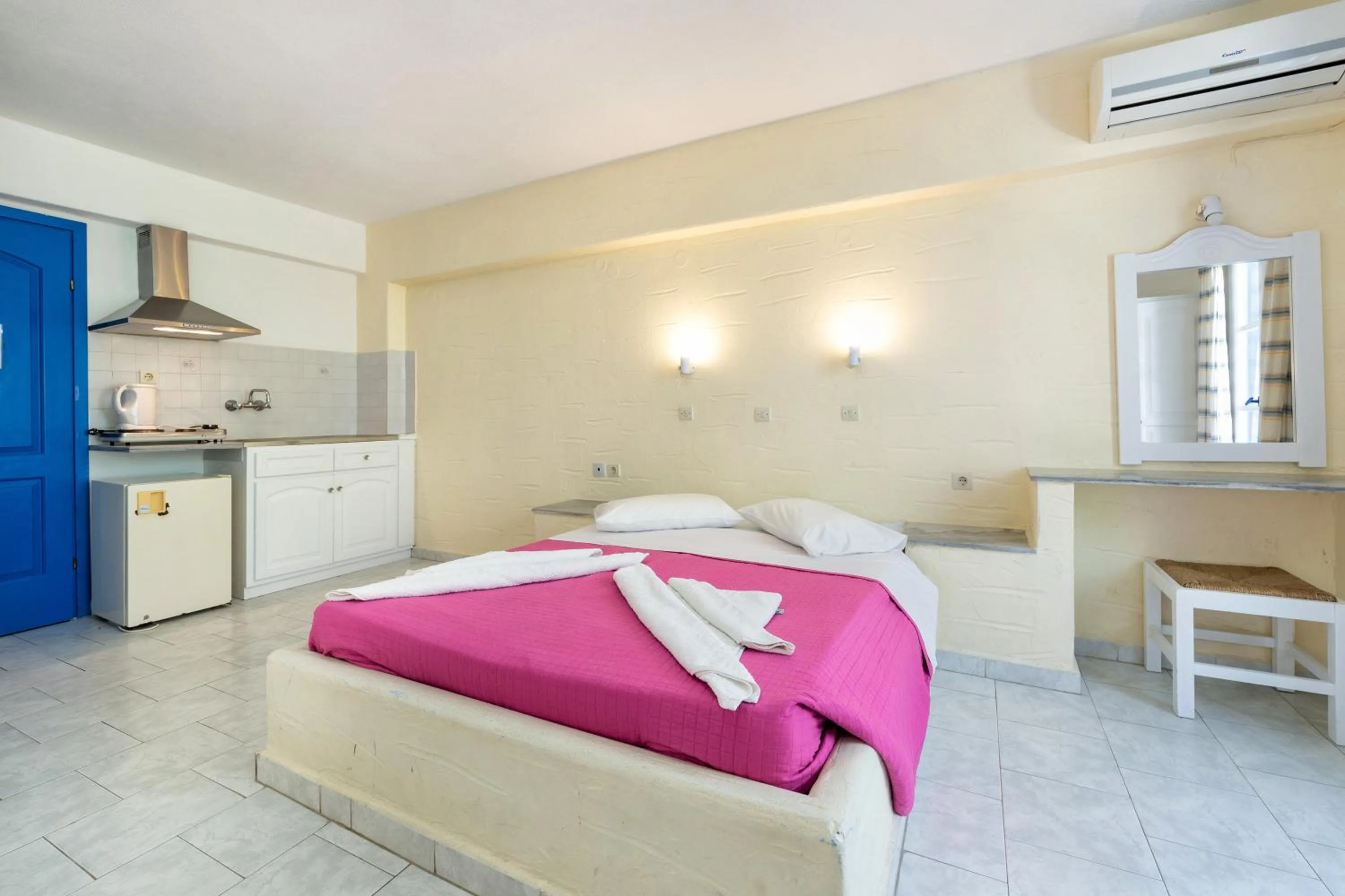 Bed in Stratos Apartments & Studios