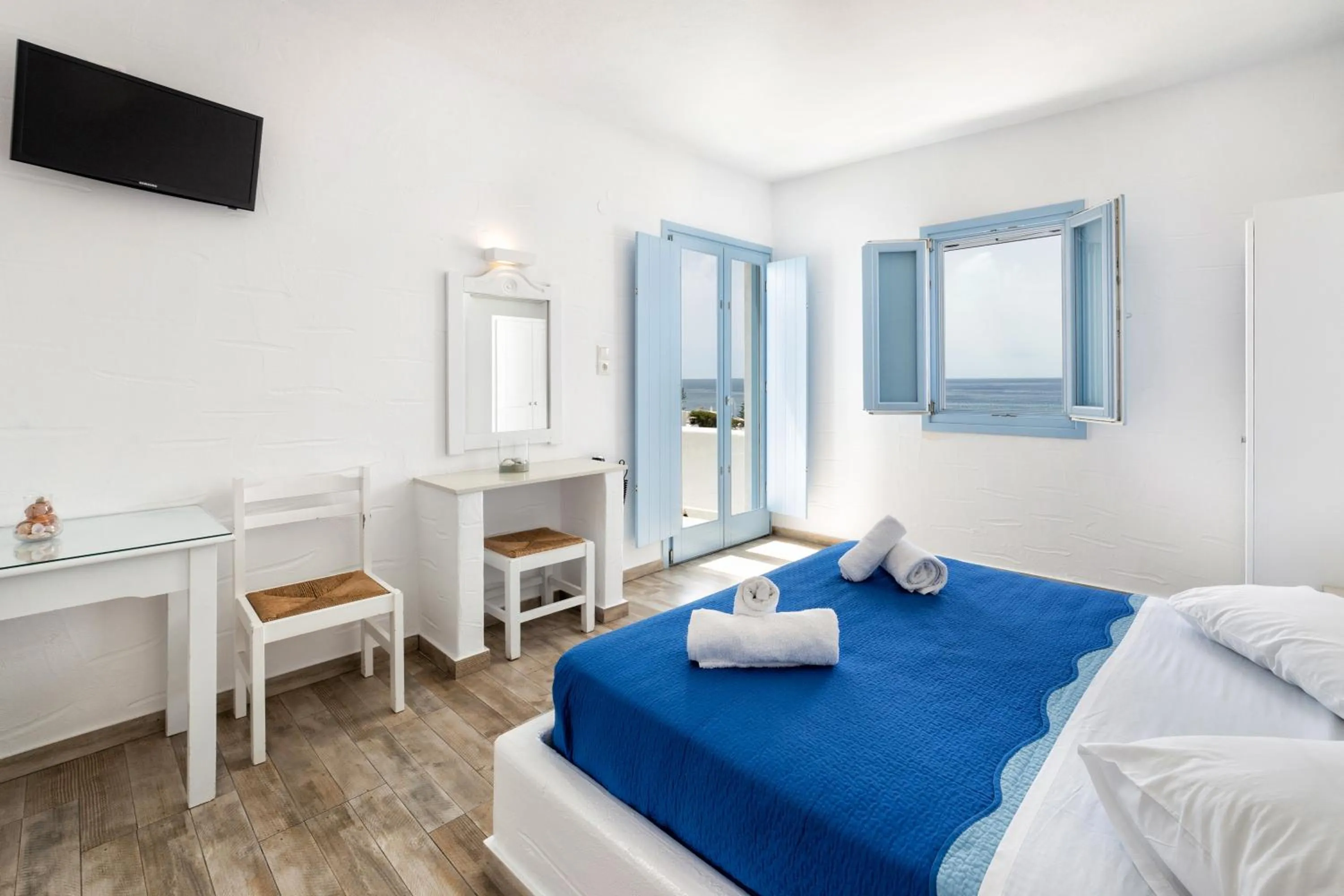 Bed in Stratos Apartments & Studios