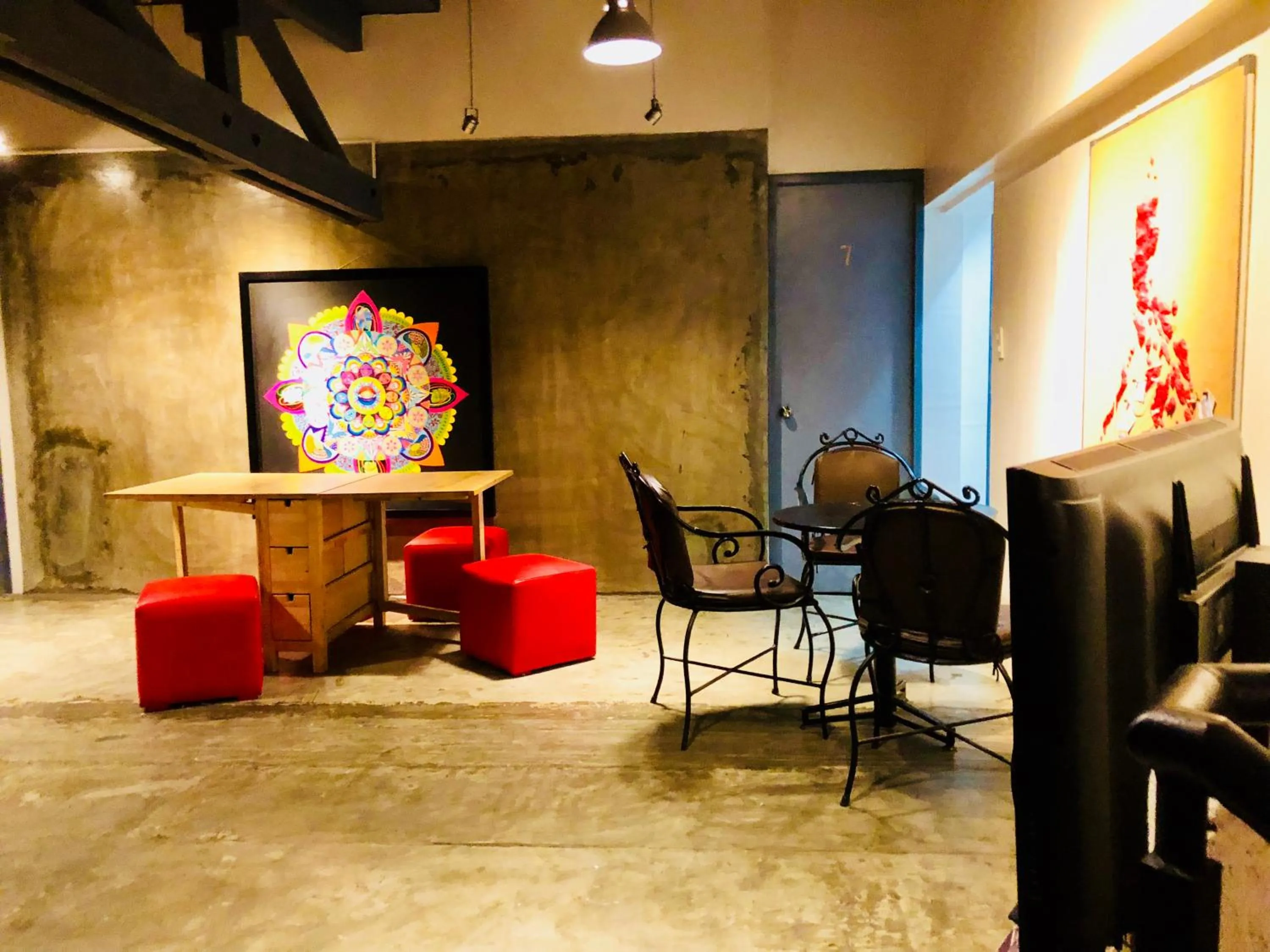 Communal lounge/ TV room in Hometown Hotel - Lacson Bacolod