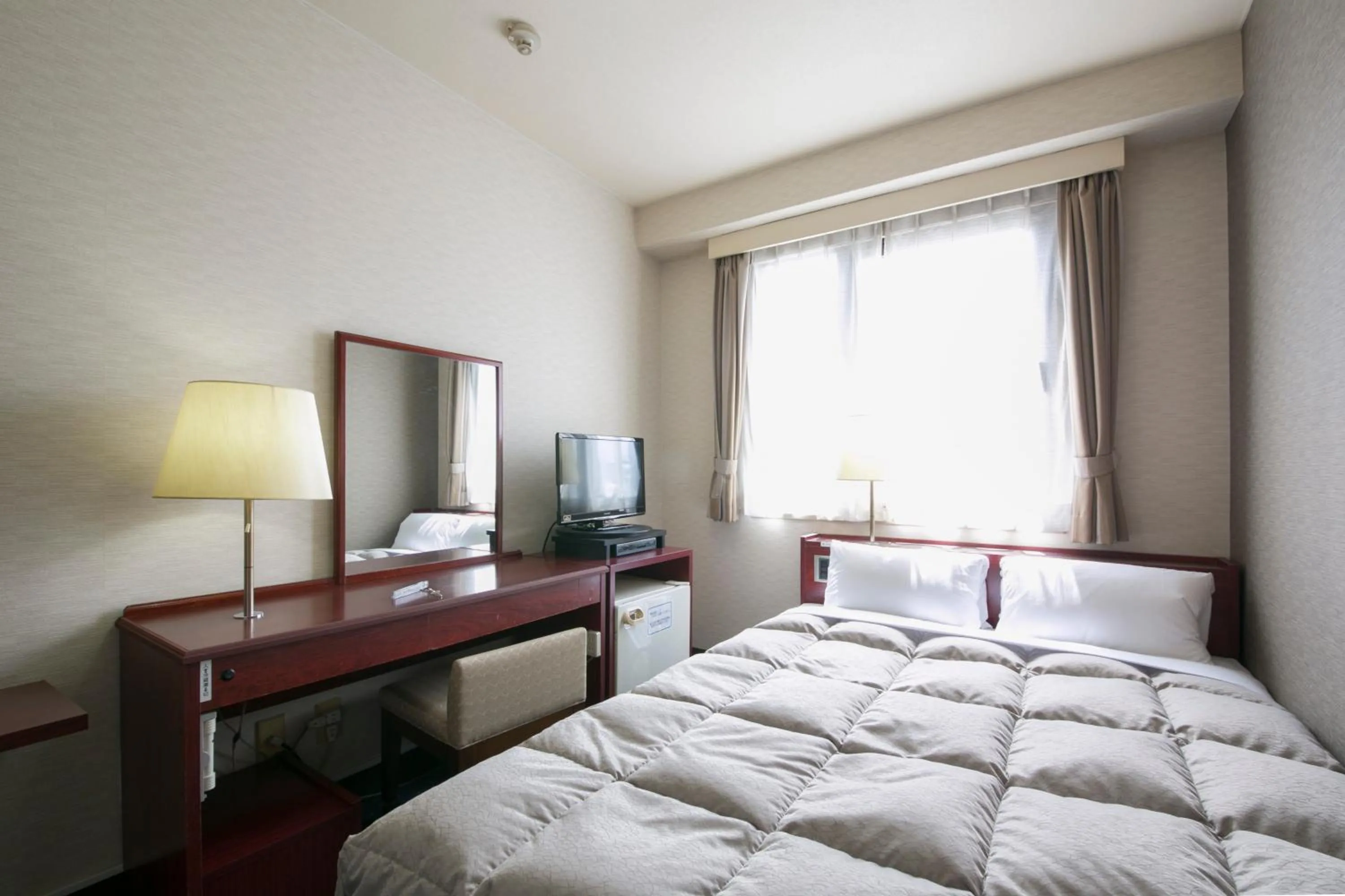 Photo of the whole room, Bed in Ise City Hotel