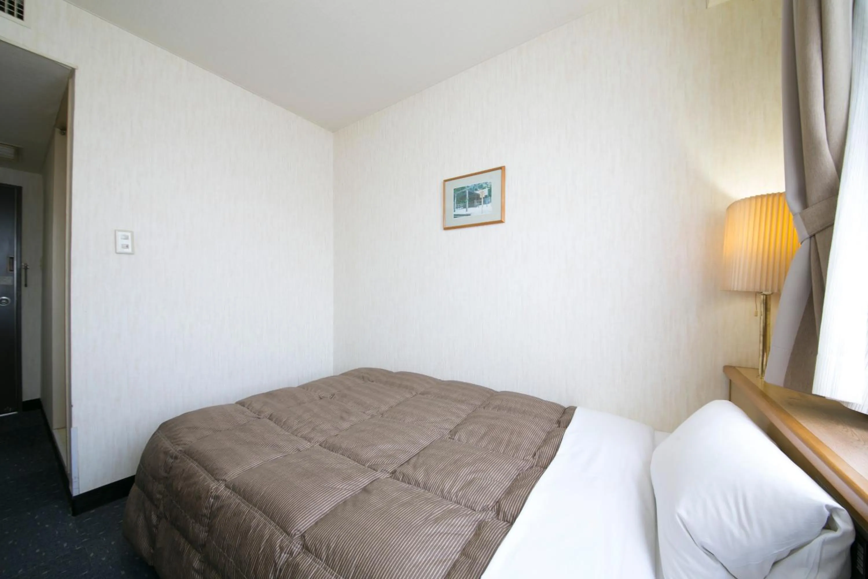 Photo of the whole room, Bed in Ise City Hotel