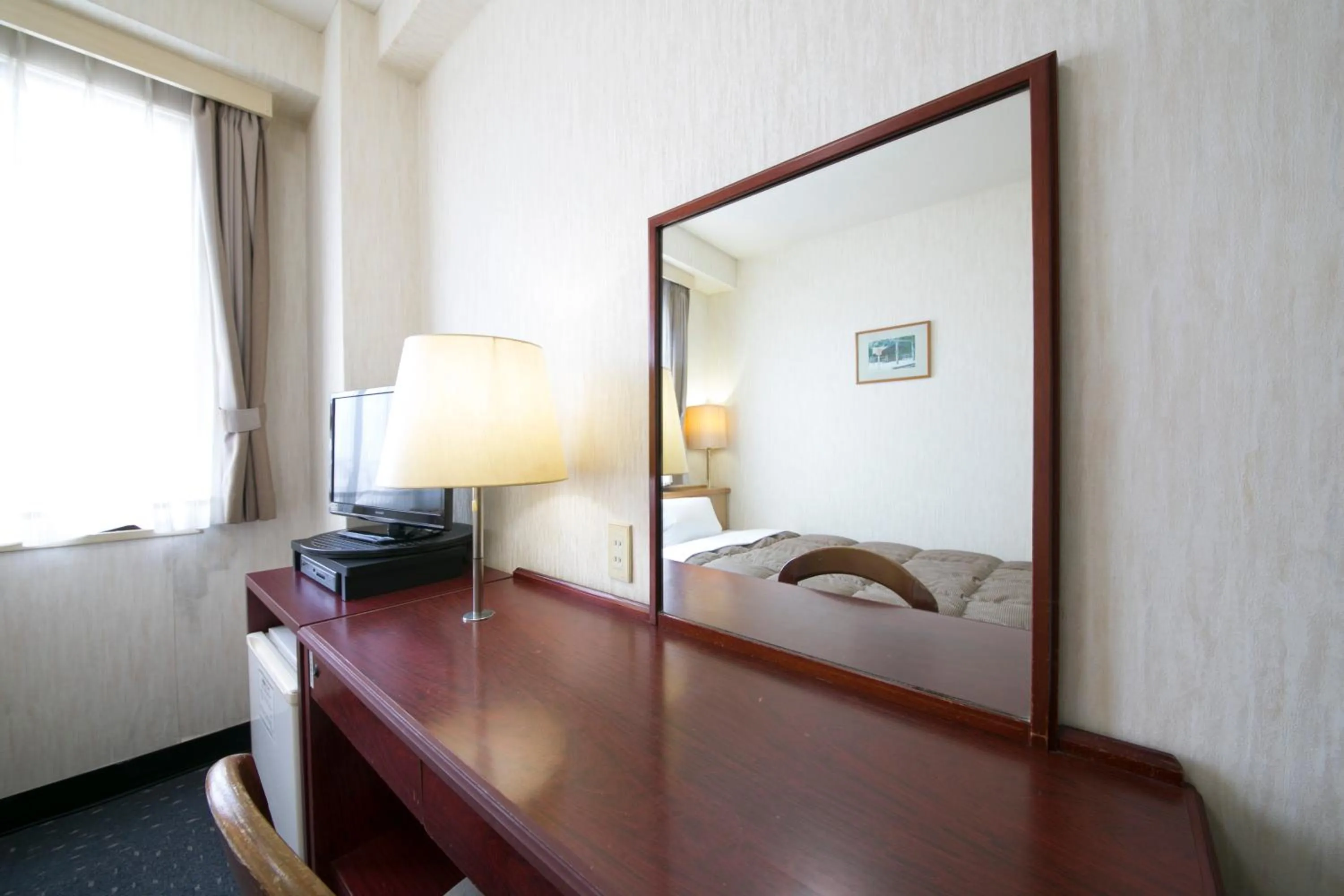 Decorative detail, Bed in Ise City Hotel