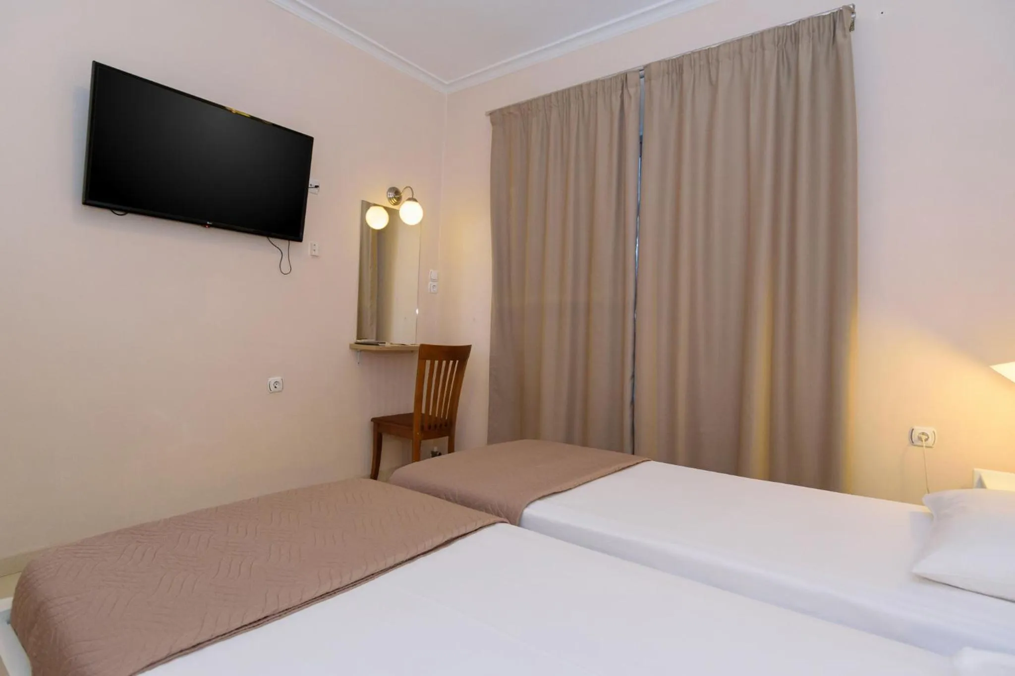 Bed in Archontiki City Hotel