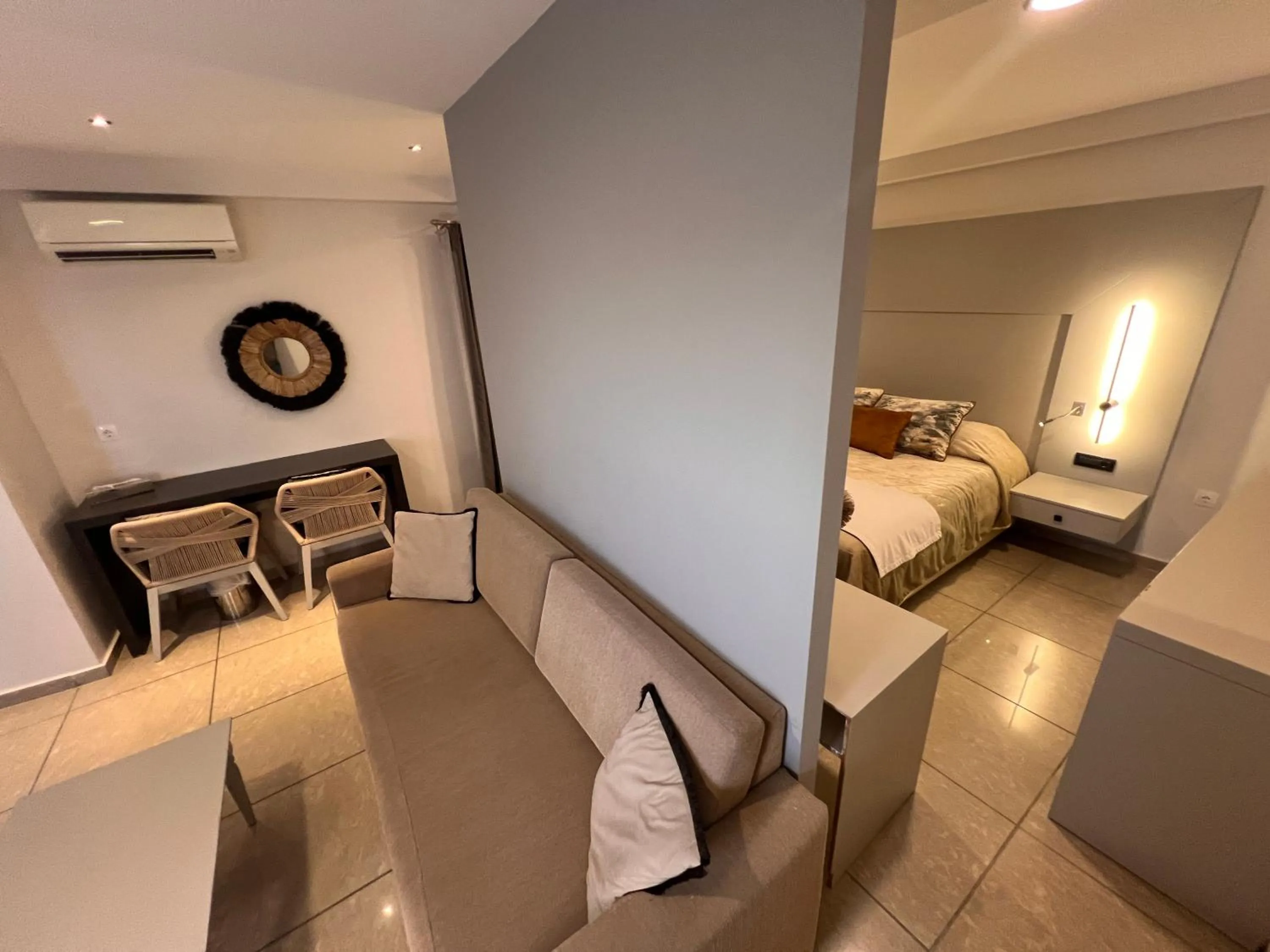 Bed in Theoxenia Caldera Hotel