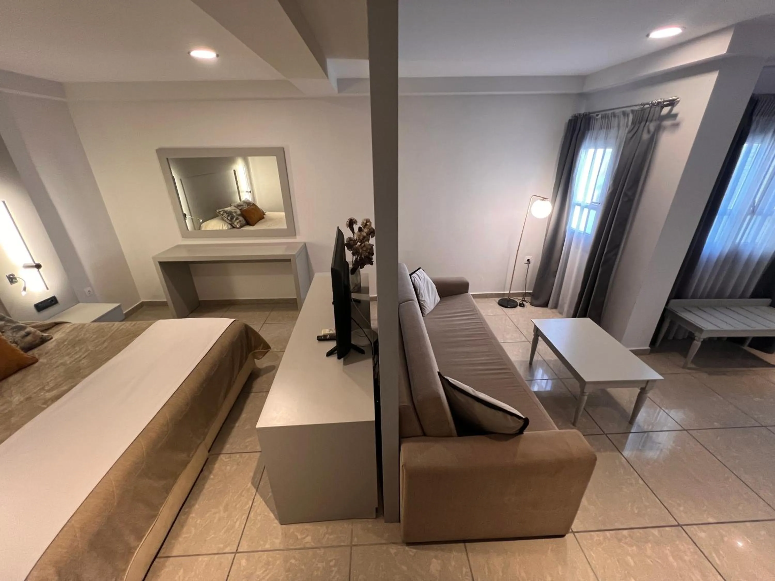 Bed in Theoxenia Caldera Hotel