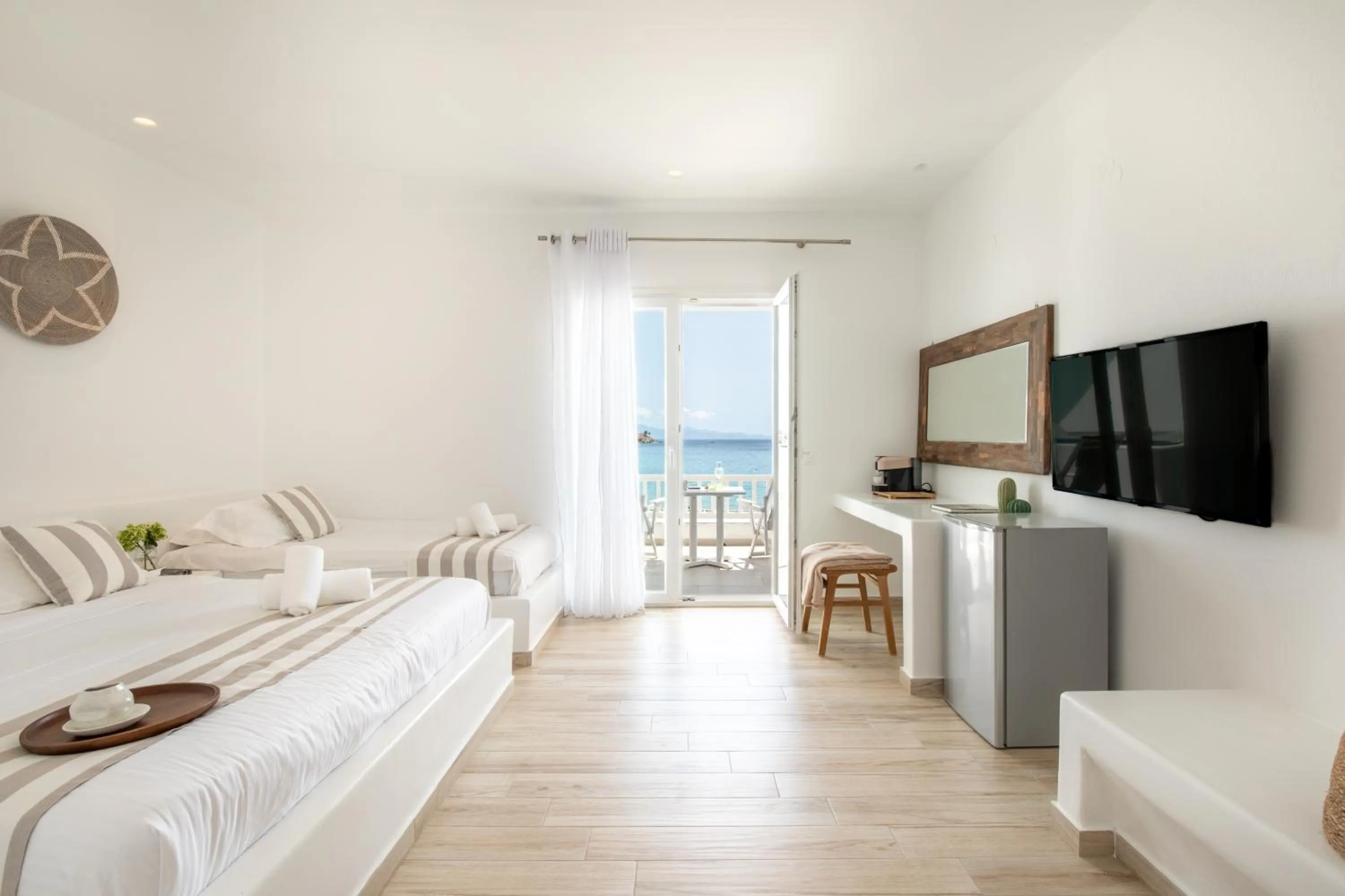 Bed in Acrogiali Beachfront Hotel Mykonos