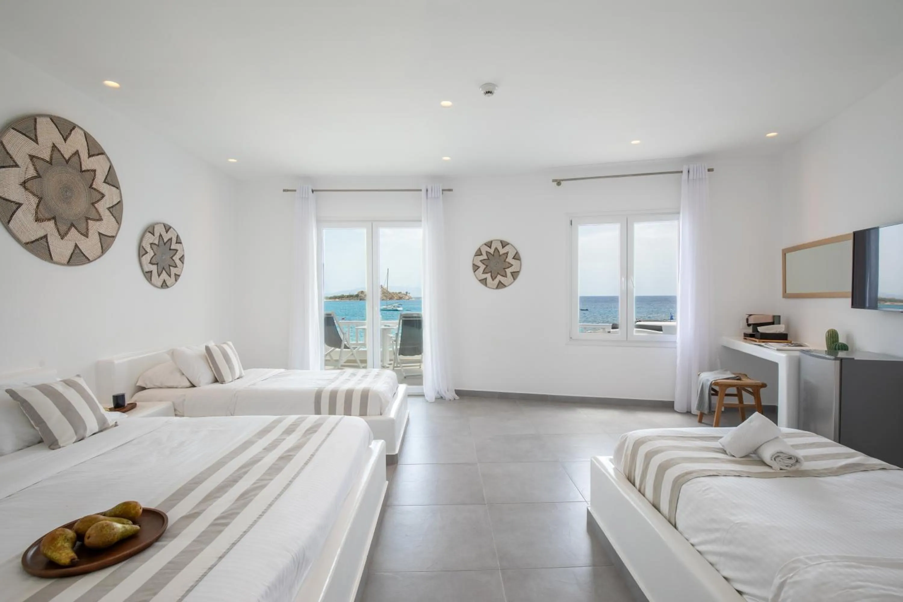 Photo of the whole room, Bed in Acrogiali Beachfront Hotel Mykonos