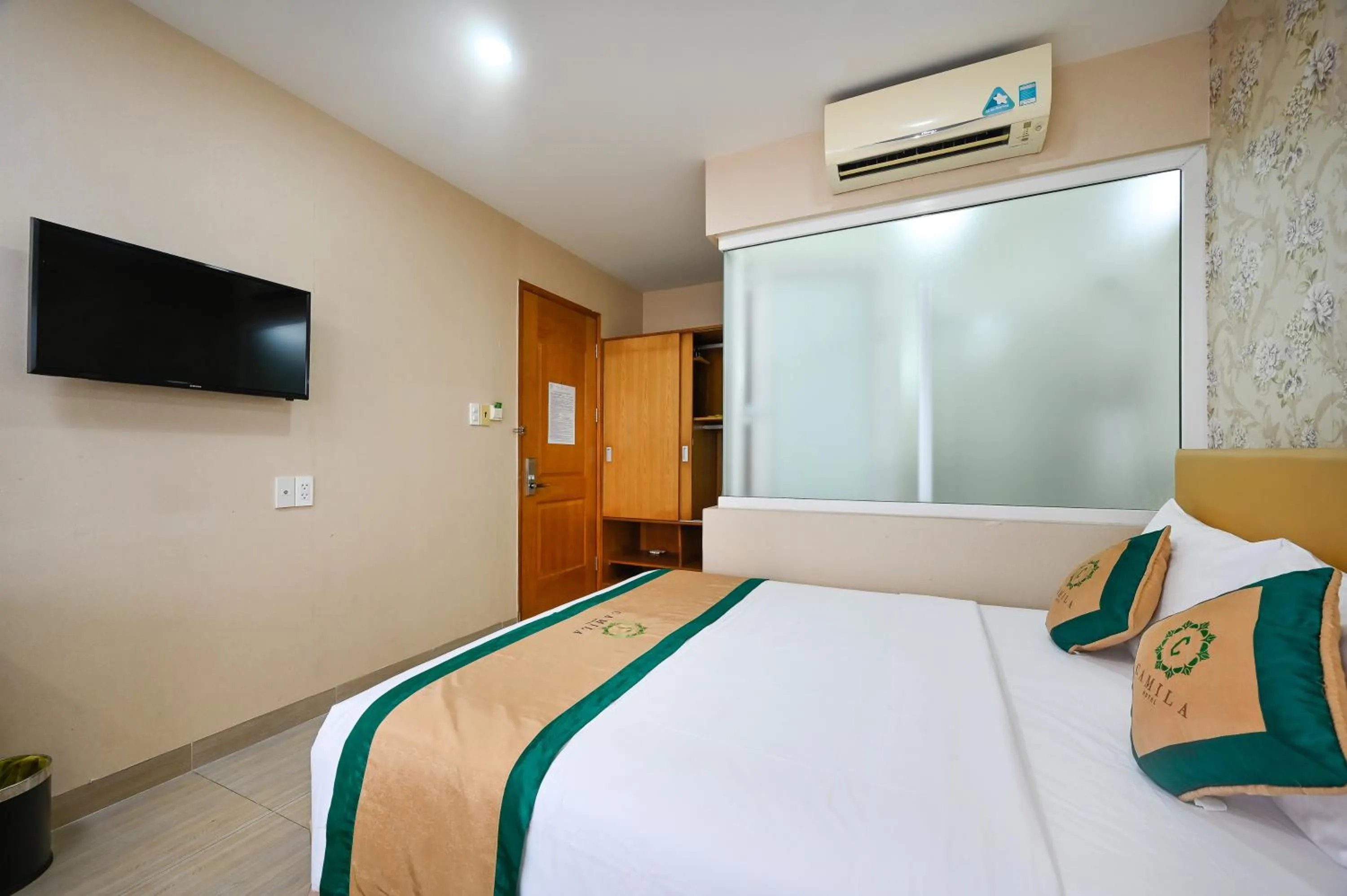 Bed in Camila Airport Hotel