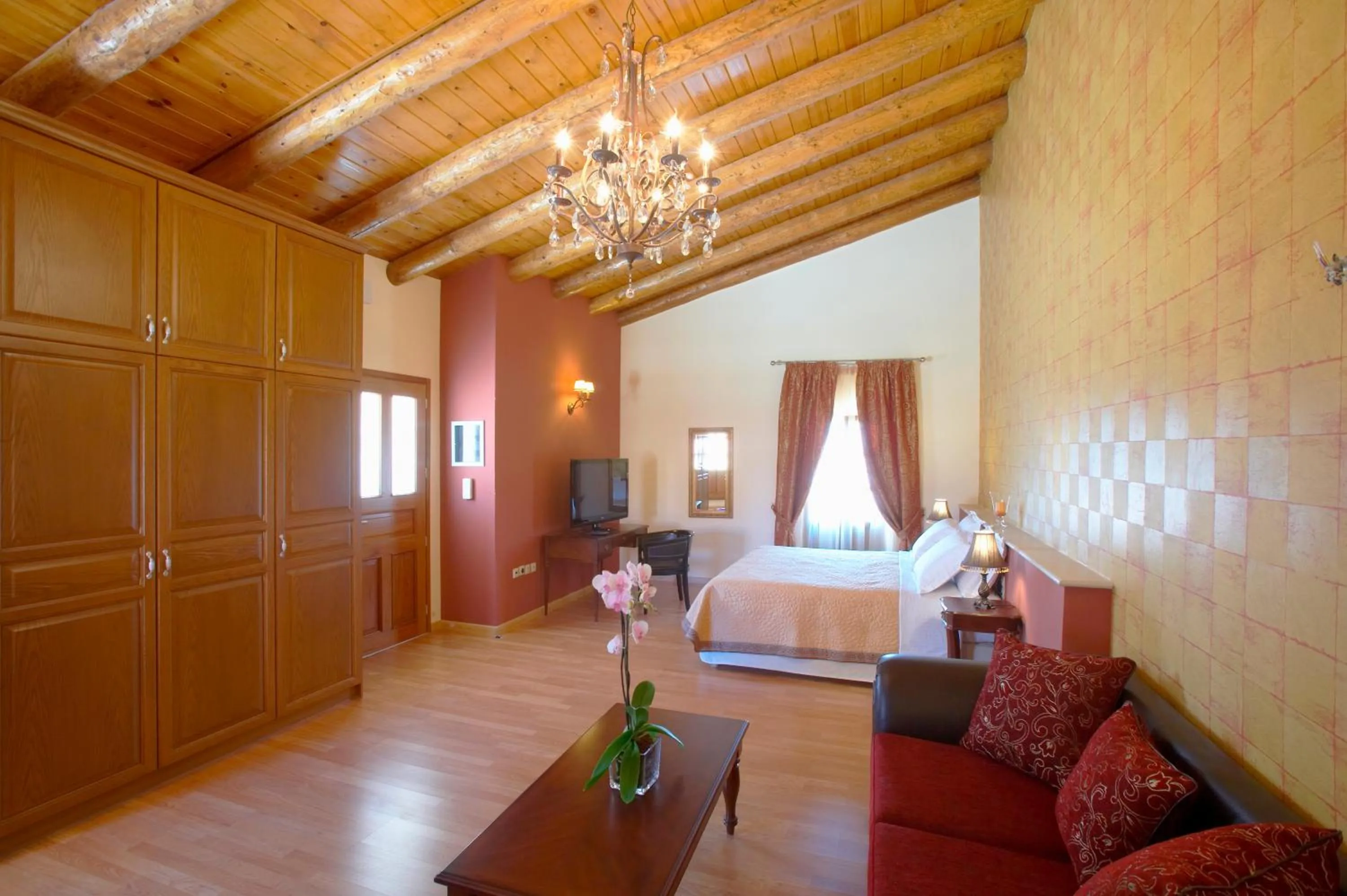 Seating area, Bed in Casa Moazzo Suites and Apartments