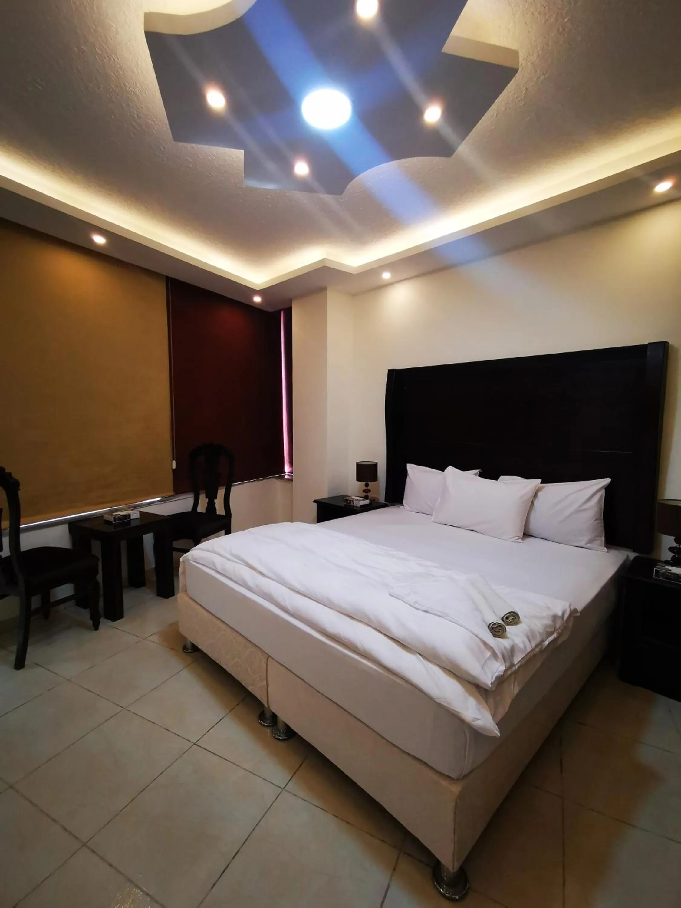Bed in Al Fakher Hotel Apartments & Suites