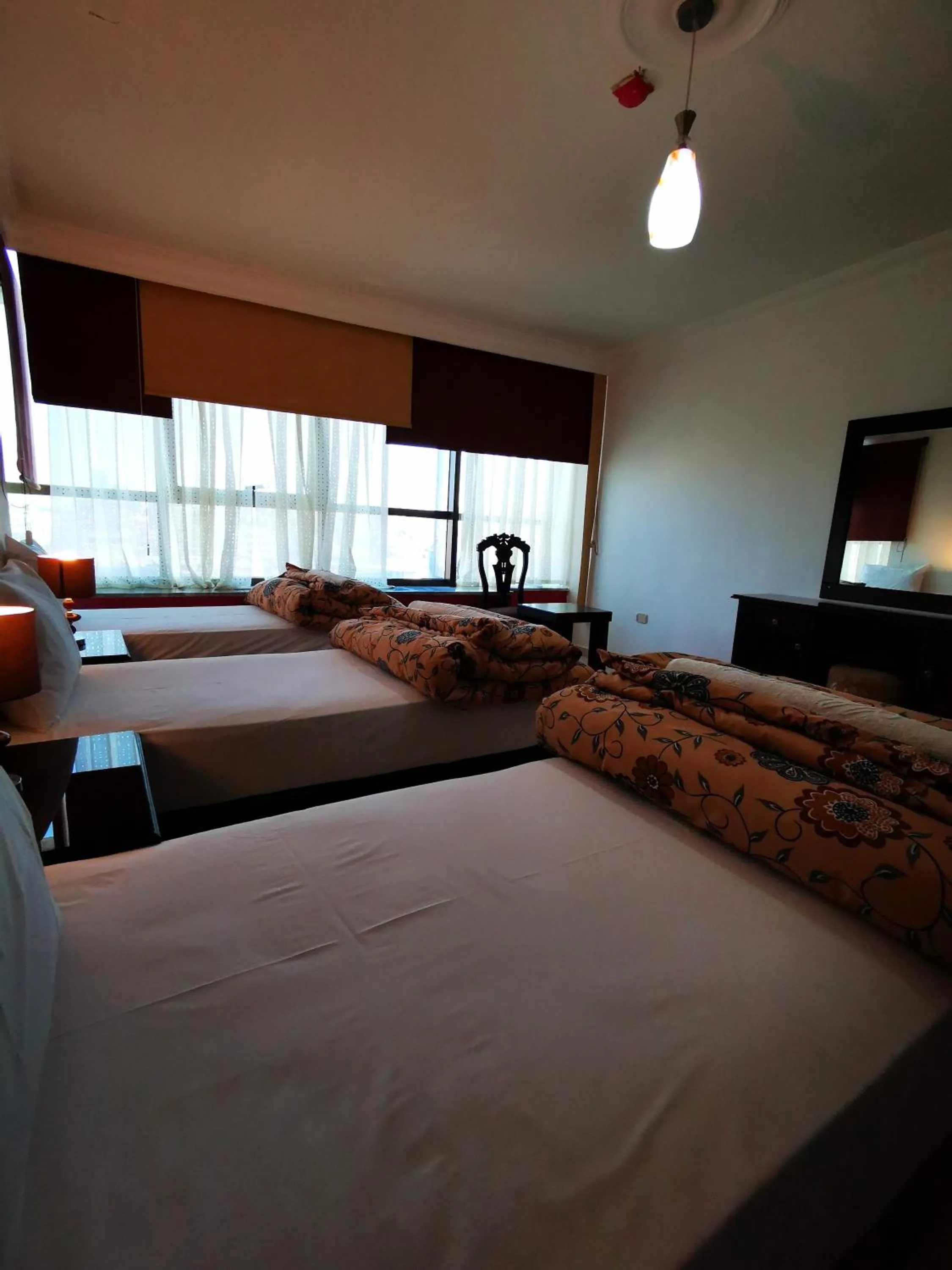 Bed in Al Fakher Hotel Apartments & Suites
