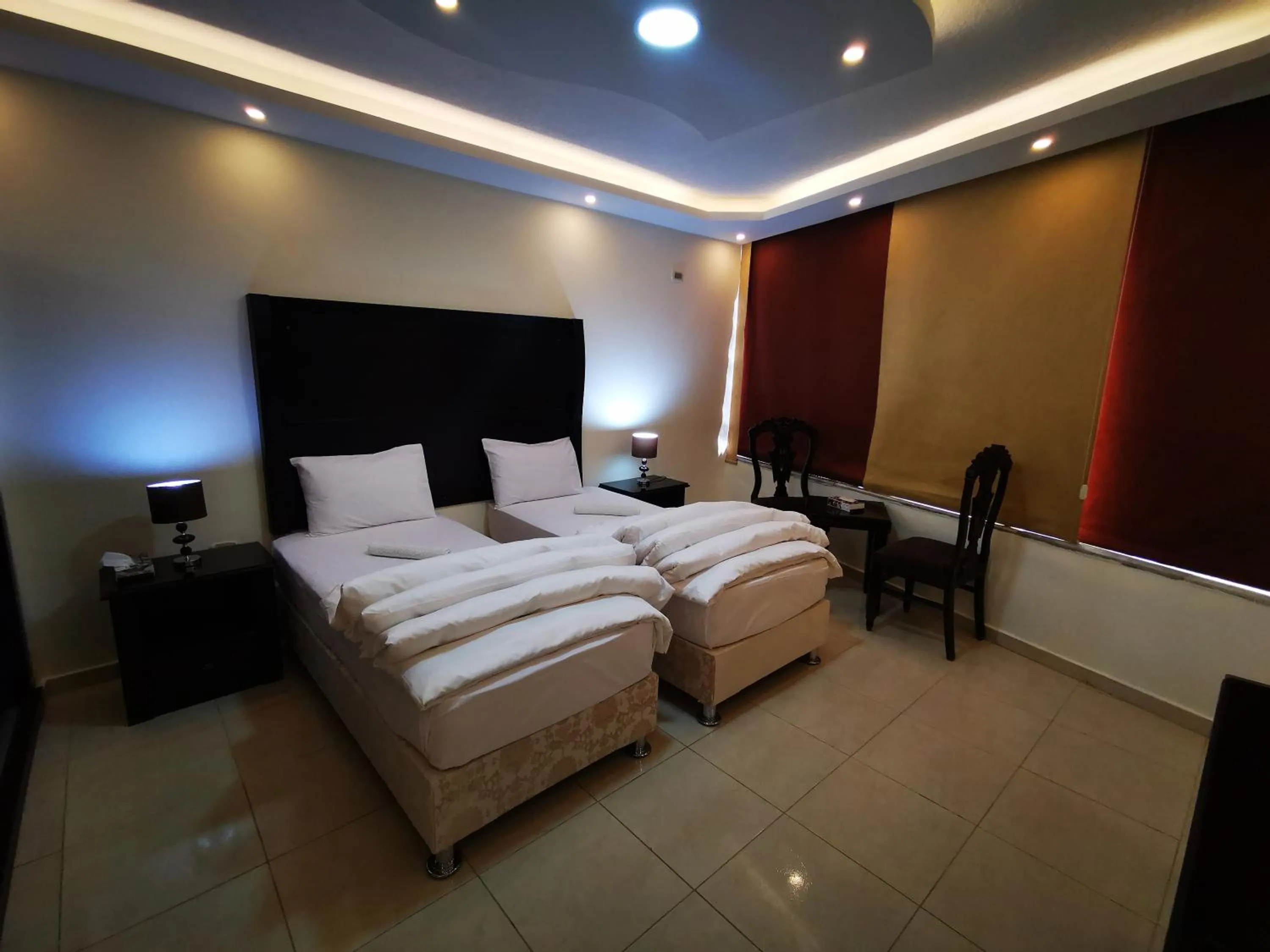 Bed in Al Fakher Hotel Apartments & Suites